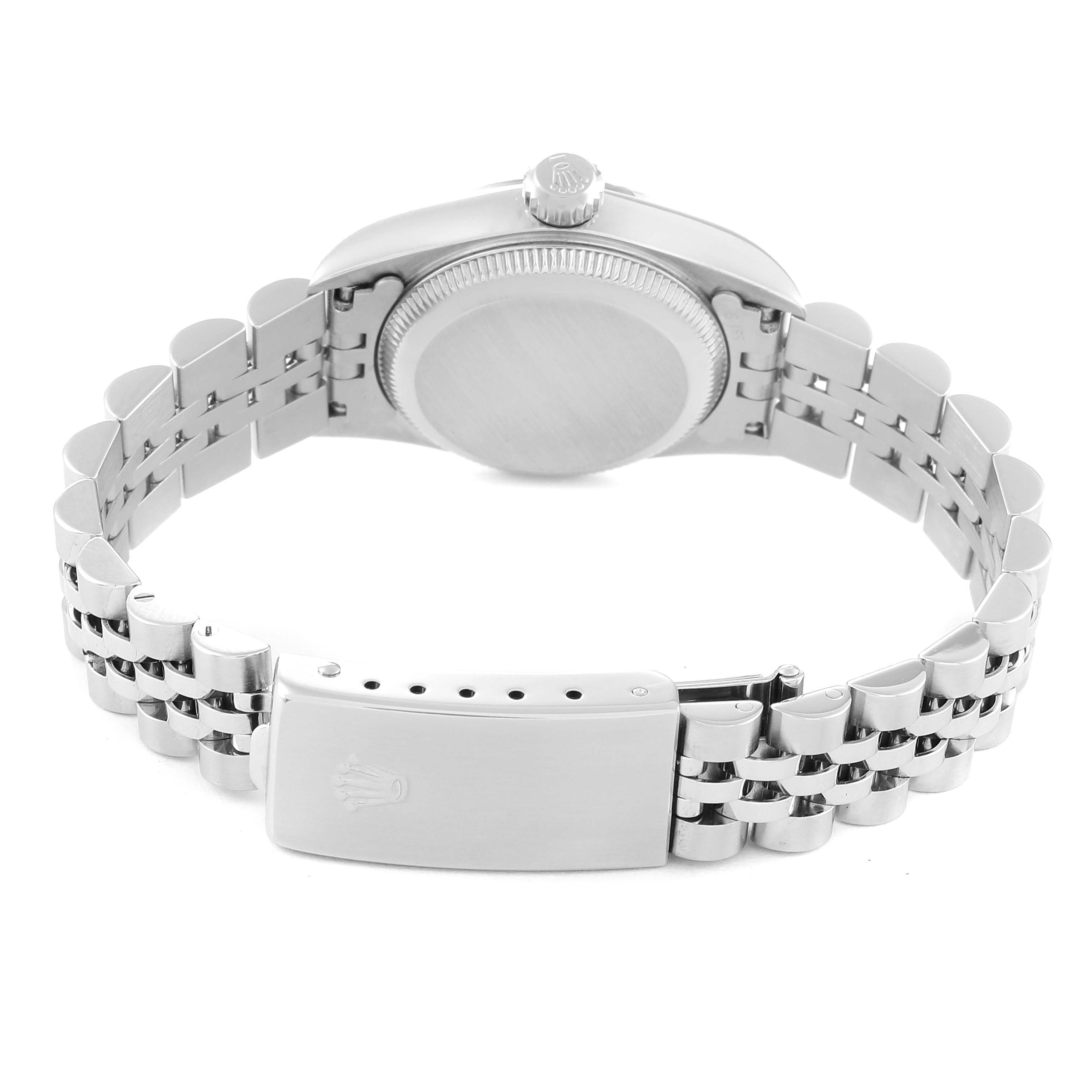 This image shows the back angle of a Rolex Oyster Perpetual 67194 Women's Stainless Steel Orange Dial 67194 Women's Stainless Steel Orange Dial watch, highlighting the case back, bracelet, and clasp.