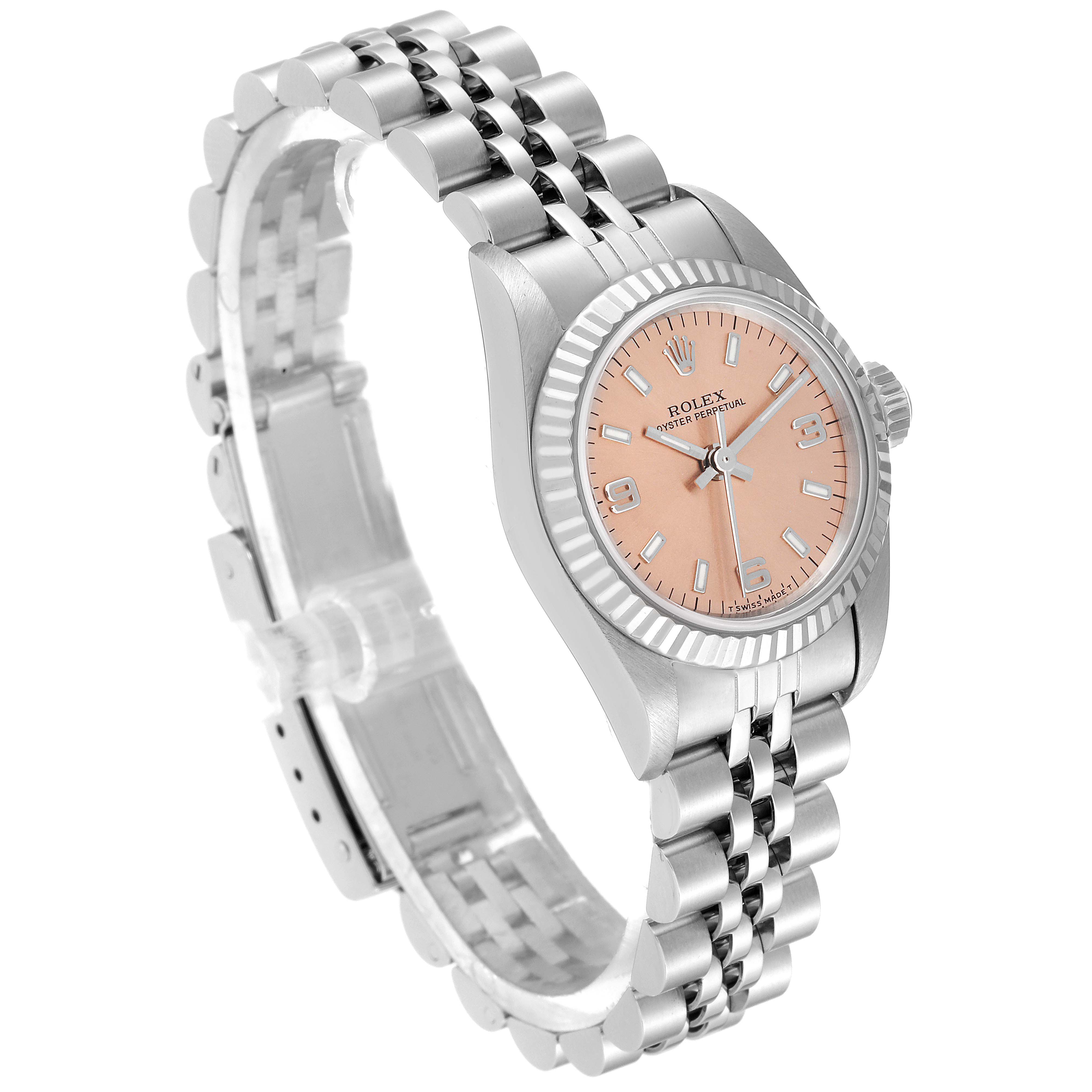 The image shows a side angle of a Rolex Oyster Perpetual 67194 Women's Stainless Steel Orange Dial 67194 Women's Stainless Steel Orange Dial watch, highlighting its bracelet, case, dial, and crown.