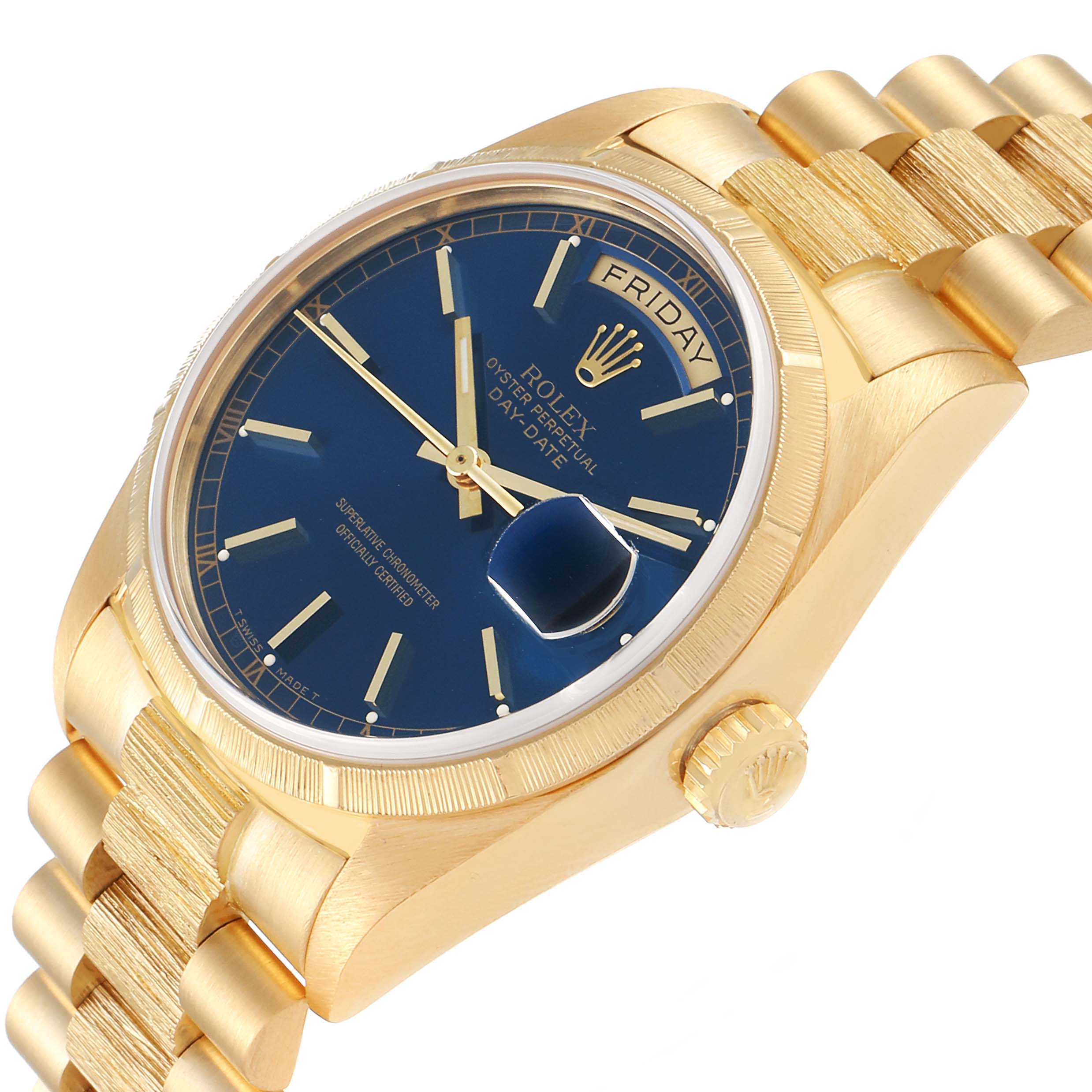 The image shows a close-up angle of the Rolex President 18078 Men's Yellow Gold Blue Dial 18078 Men's Yellow Gold Blue Dial model watch, highlighting its blue dial, day-date display, and gold bracelet.