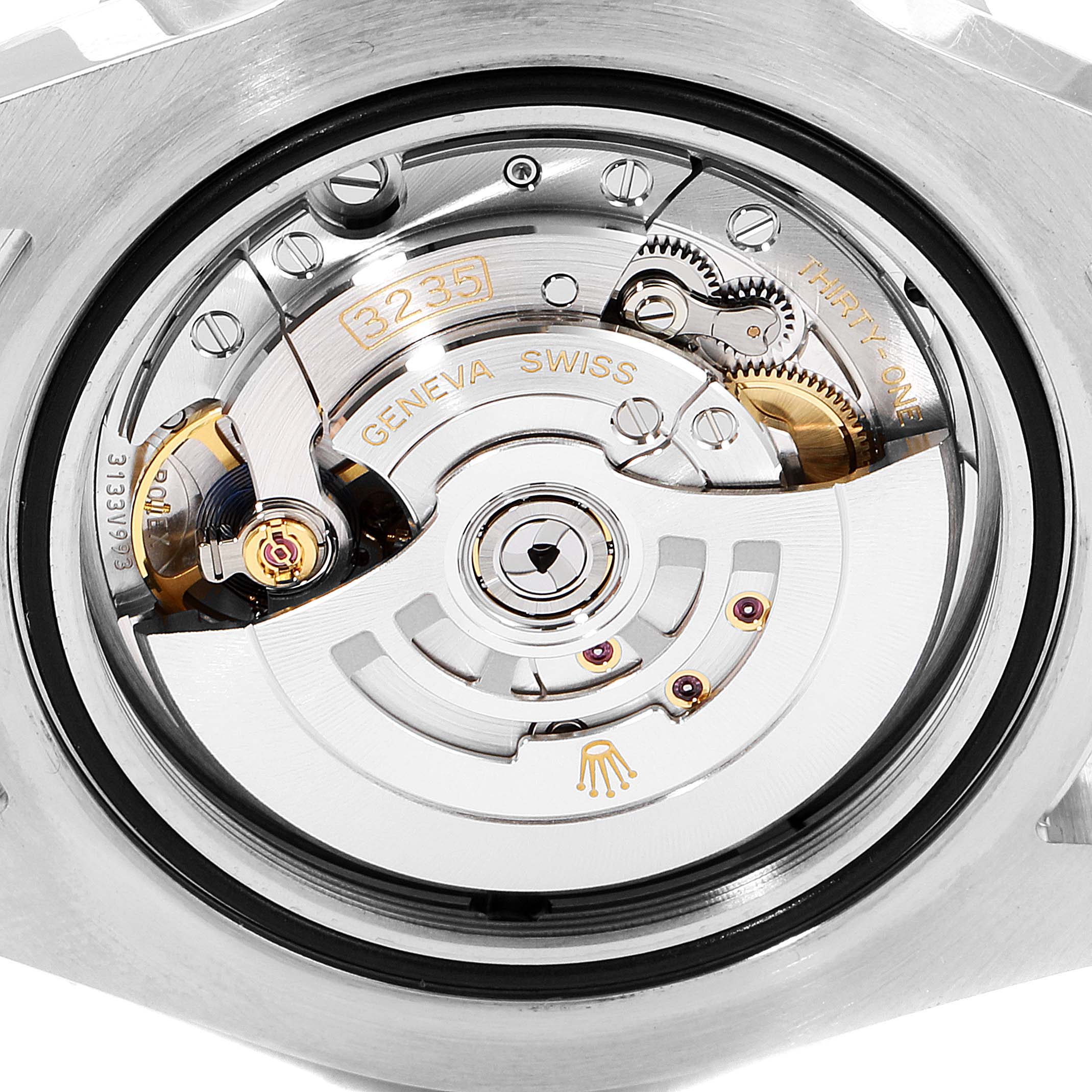 The image shows a close-up view of the movement mechanism inside a Rolex Sea-Dweller 126603 Men
s Steel and Gold (two tone) Black Dial 126603 Men
s Steel and Gold (two tone) Black Dial watch from the back.