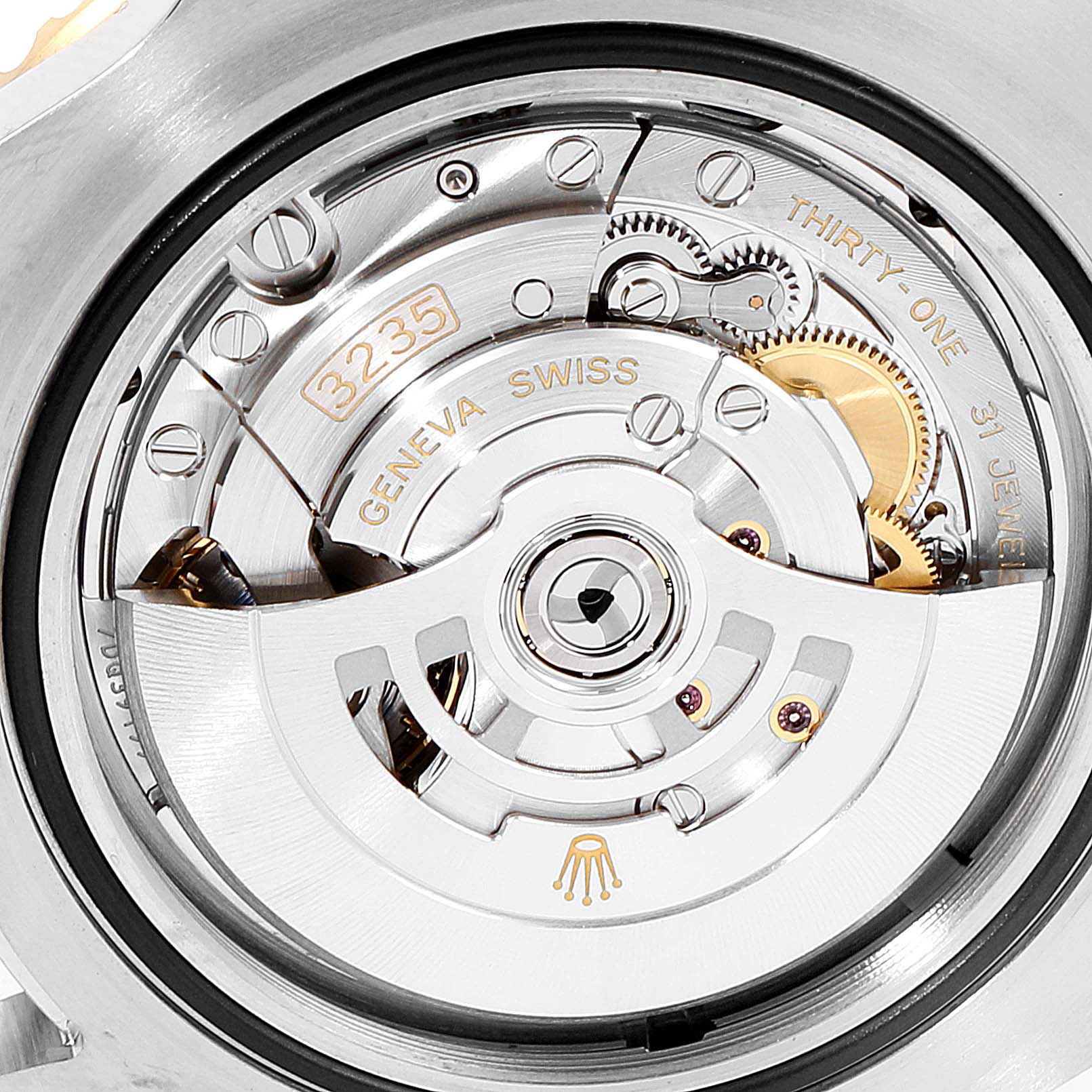 This image shows a close-up view of the movement mechanism inside a Rolex Sea-Dweller 126603 Men
s Steel and Gold (two tone) Black Dial 126603 Men
s Steel and Gold (two tone) Black Dial, featuring the caliber 3235.