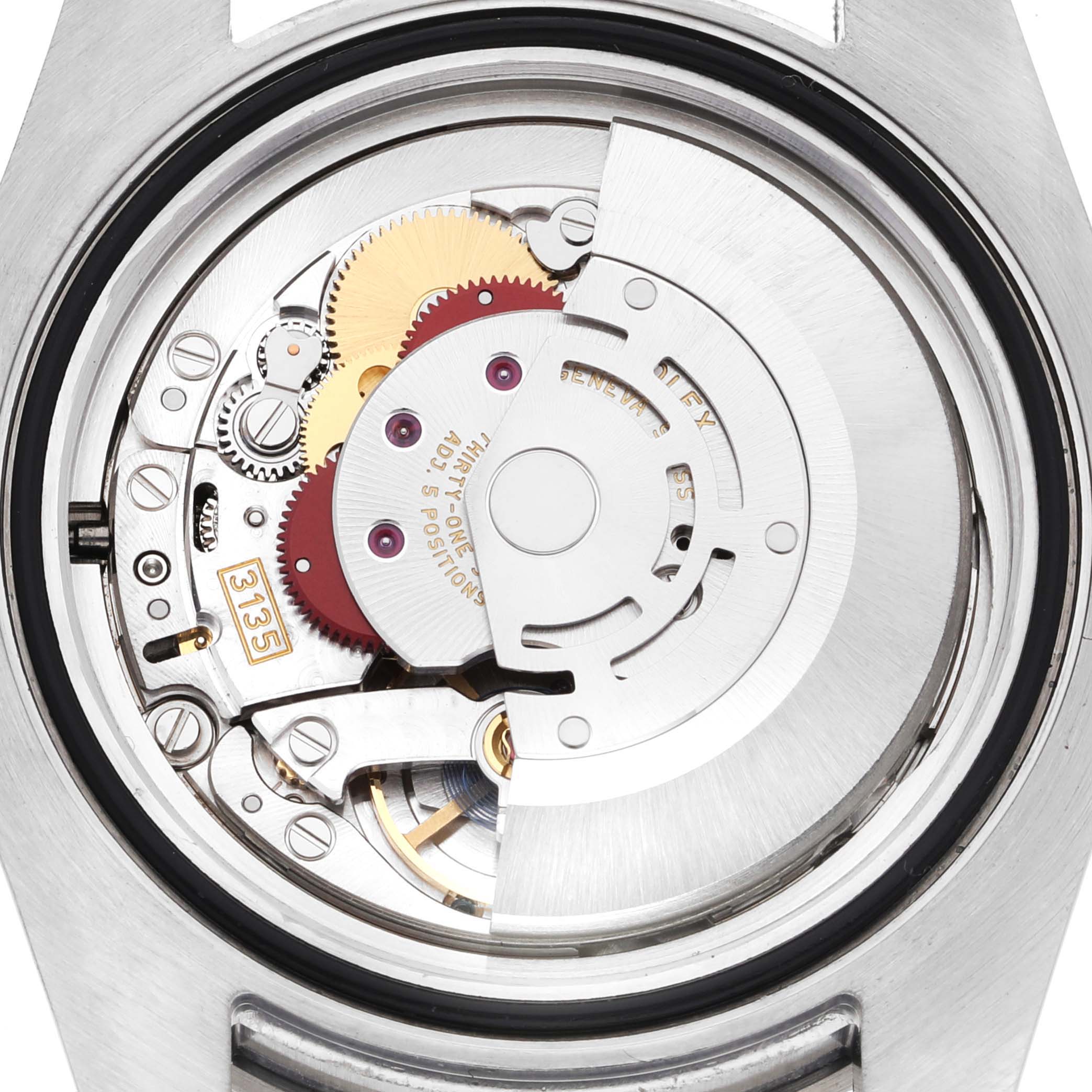 This is an internal view of the movement mechanism of a Rolex Submariner 116610LV Men's Stainless Steel Green Dial 116610LV Men's Stainless Steel Green Dial watch.