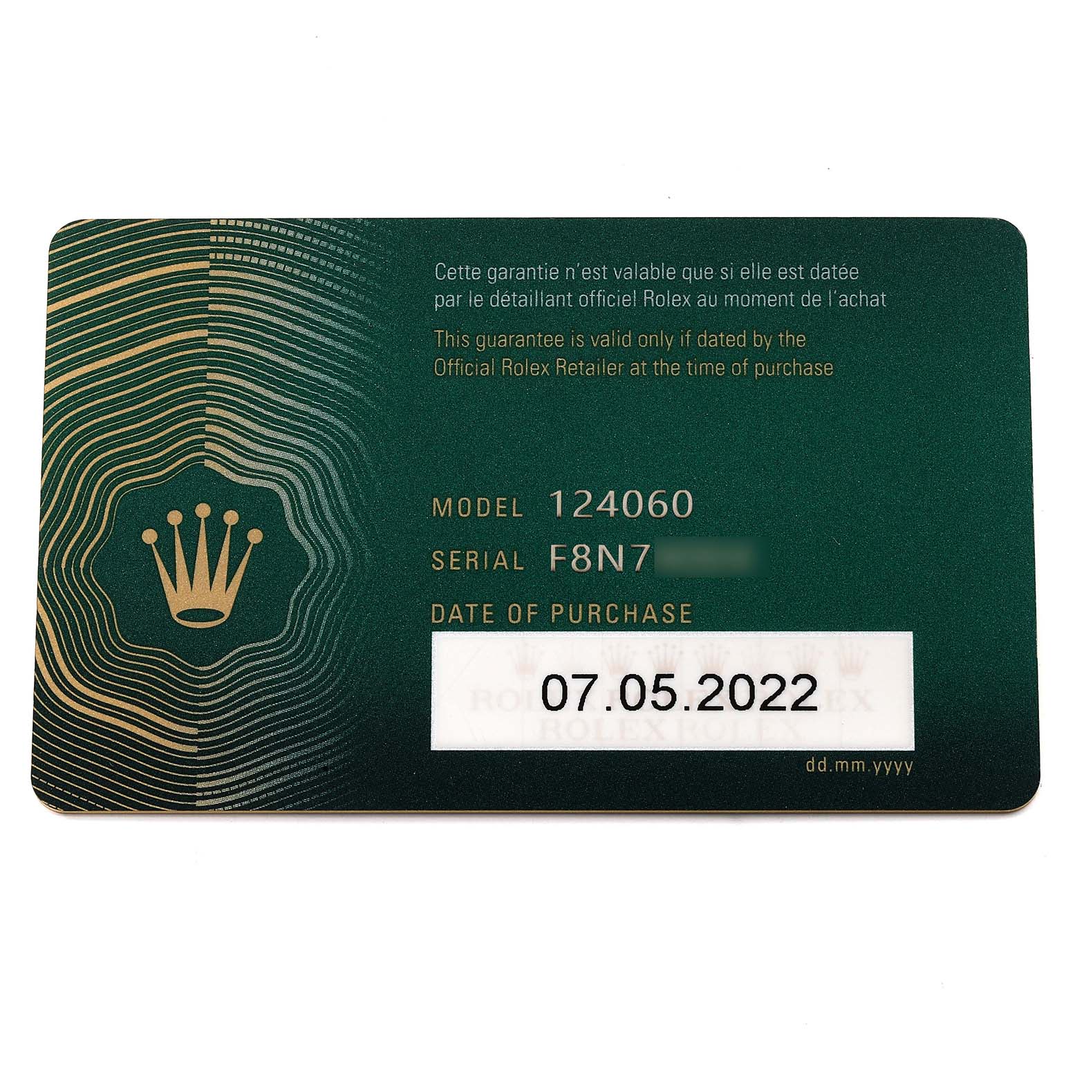 The image shows a guarantee card for a Rolex Submariner 124060 Men
s Stainless Steel Black Dial 124060 Men
s Stainless Steel Black Dial model 124060, including the serial number and purchase date.