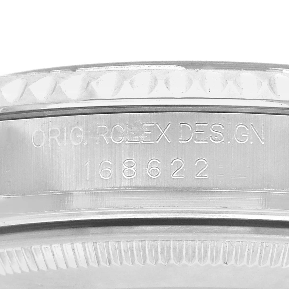 The image shows a close-up of the side of a Rolex Yacht-Master 168622 Men's Stainless Steel Silver Dial watch, highlighting the engraved model number and "ORIG. ROLEX DESIGN" inscription.