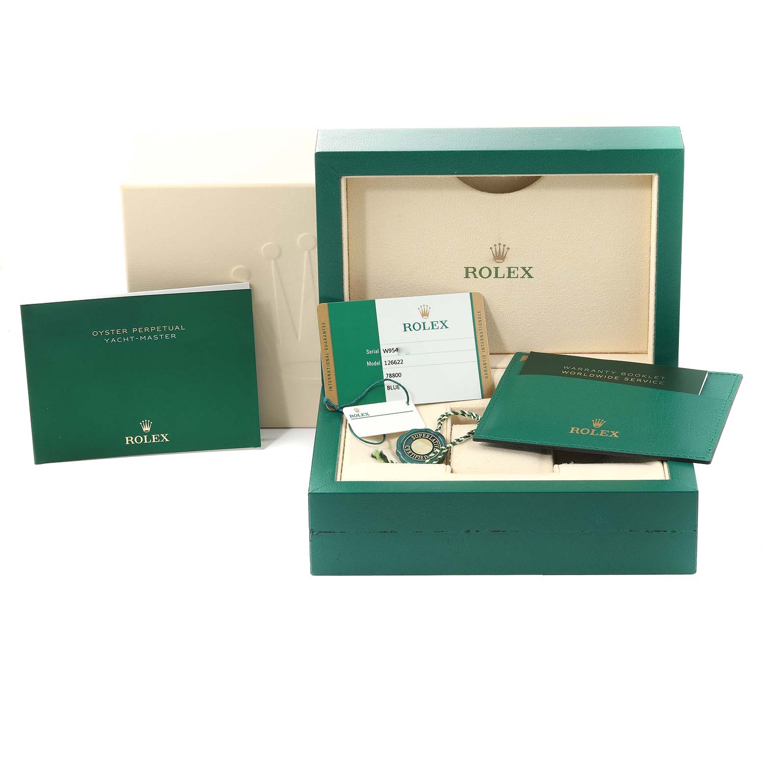 The image shows the accessories of a Rolex Yacht-Master 126622 Men's Stainless Steel Blue Dial 126622 Men's Stainless Steel Blue Dial model, including the box, warranty card, booklet, and tags.