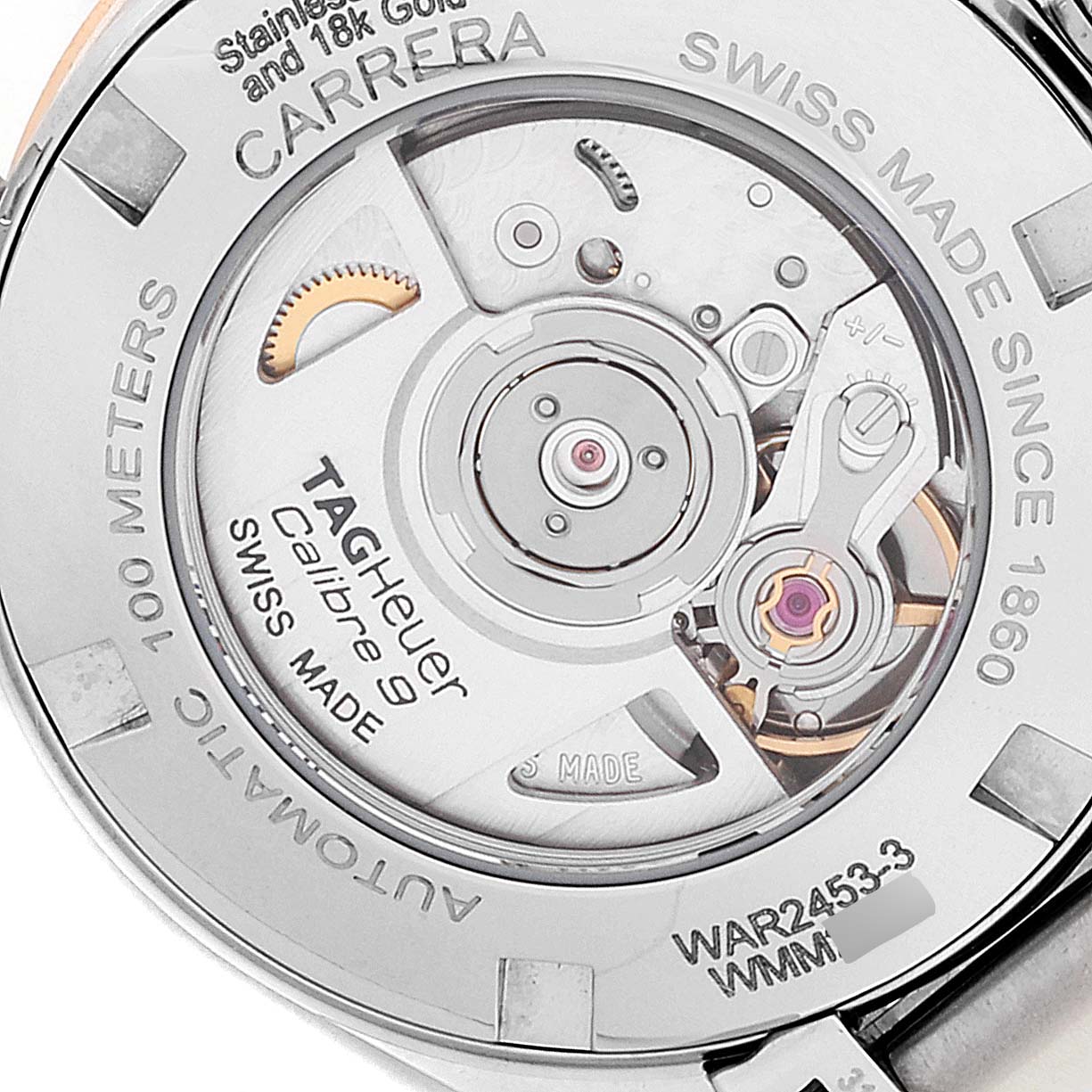 The image shows the back case of the Tag Heuer Carrera WAR2453.BD0777 Women's Steel and Gold (two tone) Mother of Pearl Dial WAR2453.BD0777 Women's Steel and Gold (two tone) Mother of Pearl Dial watch, revealing its automatic movement mechanism and engravings.