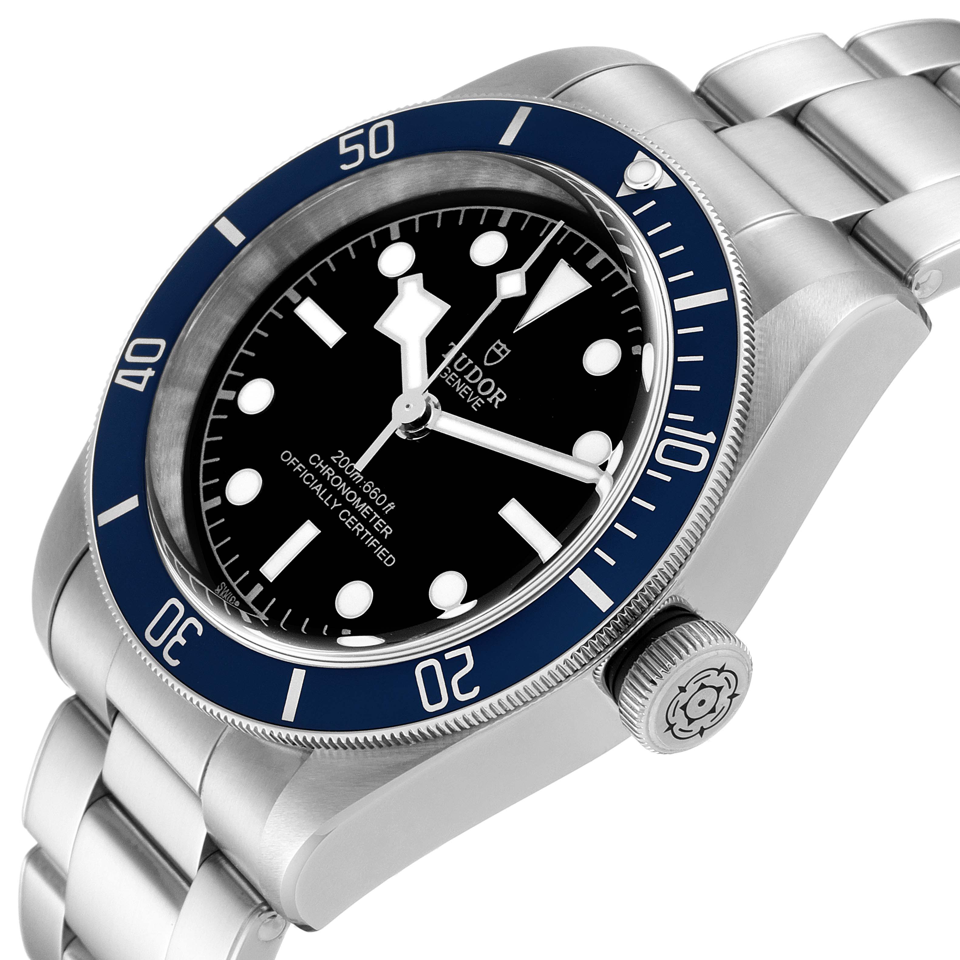 This image shows a Heritage Black Bay watch by Tudor from an angled top view, highlighting the dial, bezel, crown, and bracelet.