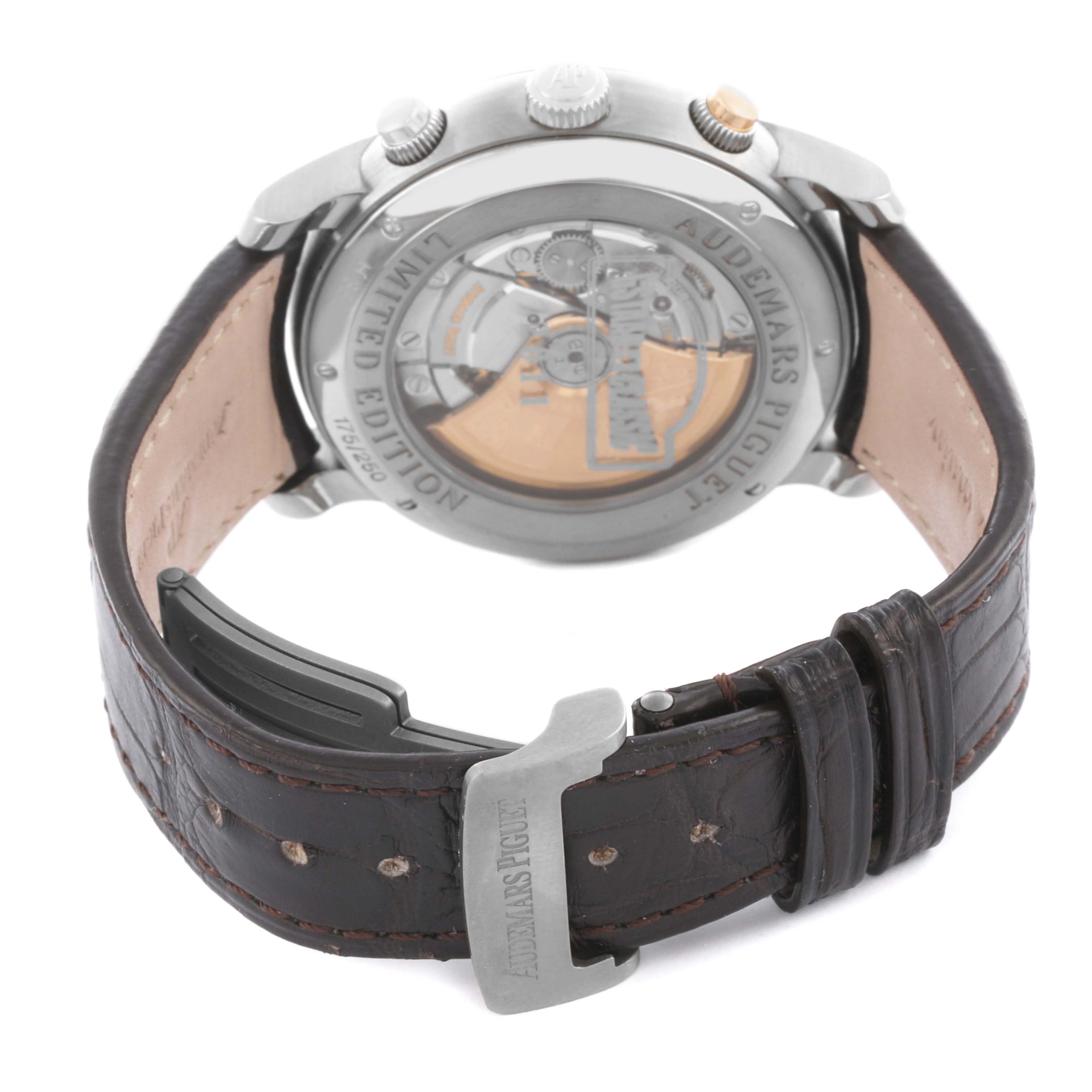 The Audemars Piguet Jules 26558TI.OO.D080VE.01 Men
s Titanium Grey Dial 26558TI.OO.D080VE.01 Men
s Titanium Grey Dial watch is viewed from the back, showing the open case back, crown, pushers, and leather strap.