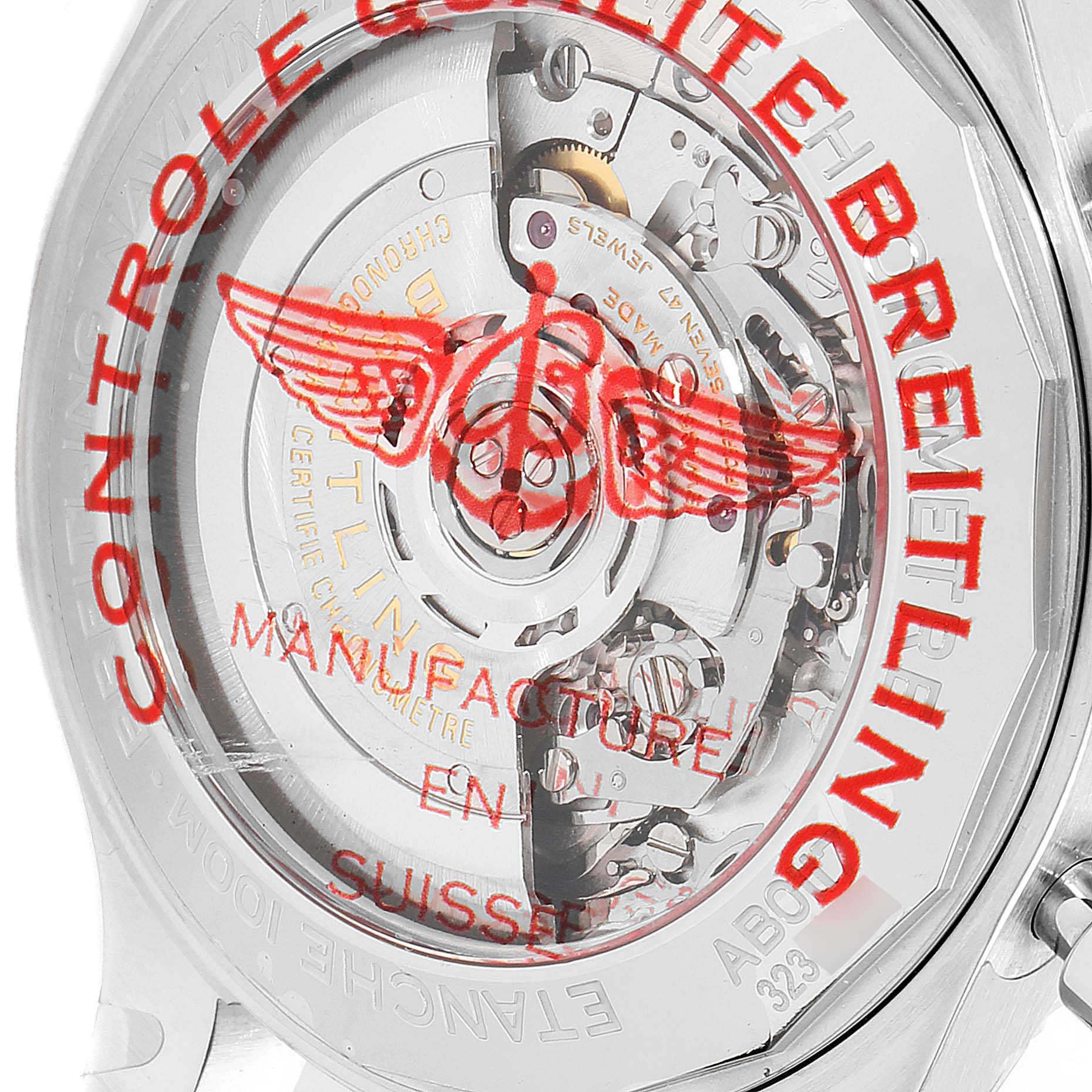 The image shows the back of a Breitling Navitimer, highlighting its intricate movement and branding.