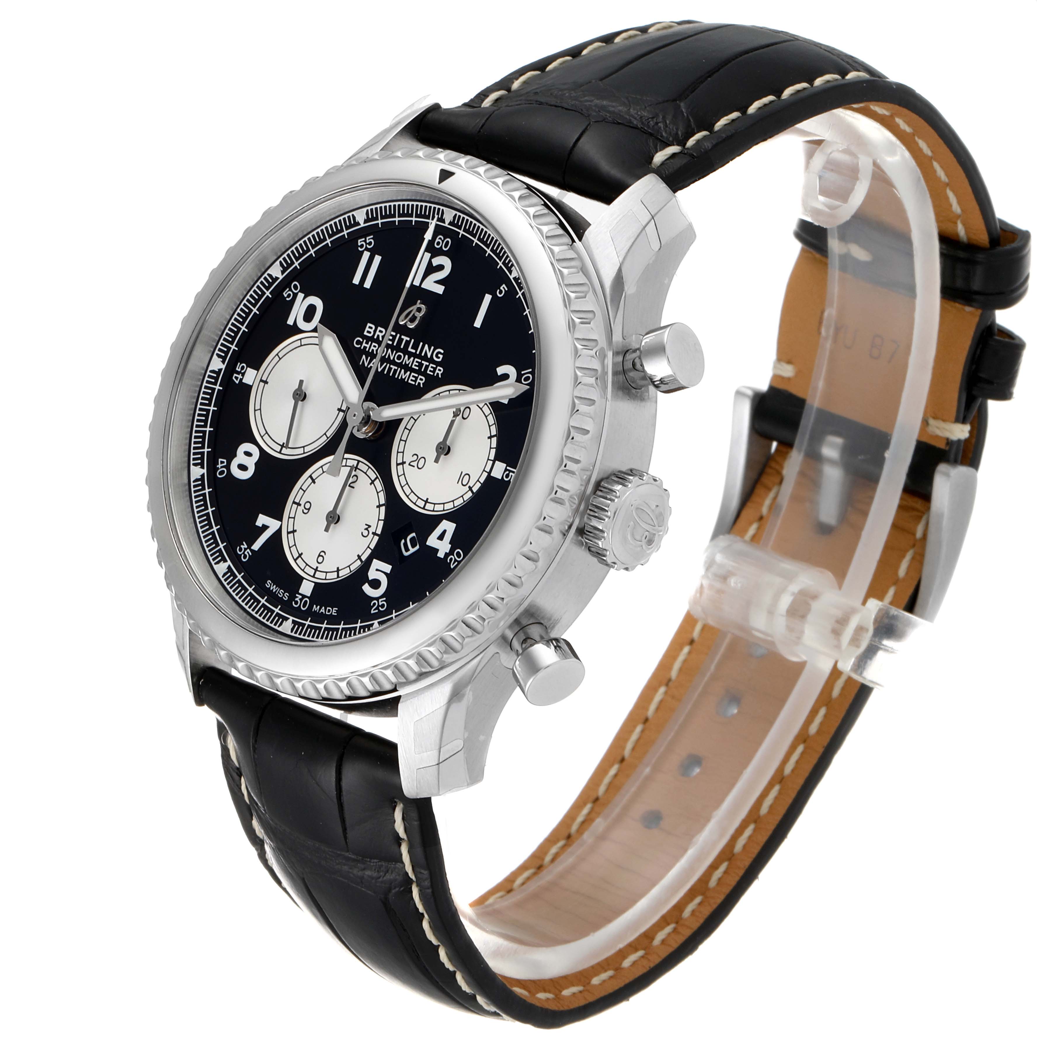 The image displays a Breitling Navitimer watch at a three-quarter angle, showcasing its face, bezel, pushers, and leather strap.