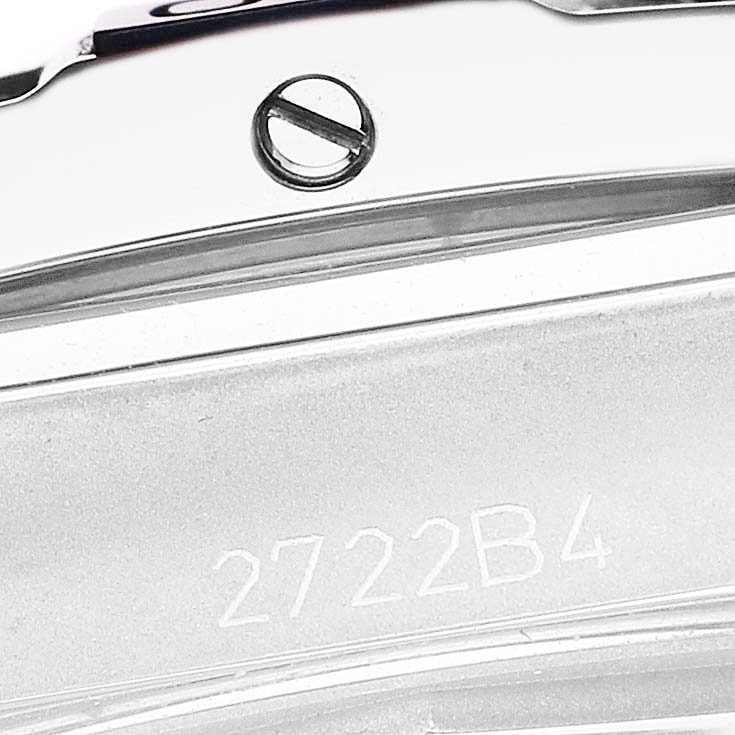 The image shows a close-up of the side of a Breitling A17356 Women's Stainless Steel Blue Dial A17356 Women's Stainless Steel Blue Dial Super Chronomat Blue Dial Steel Diamond Ladies Watch A17356 with engraving.