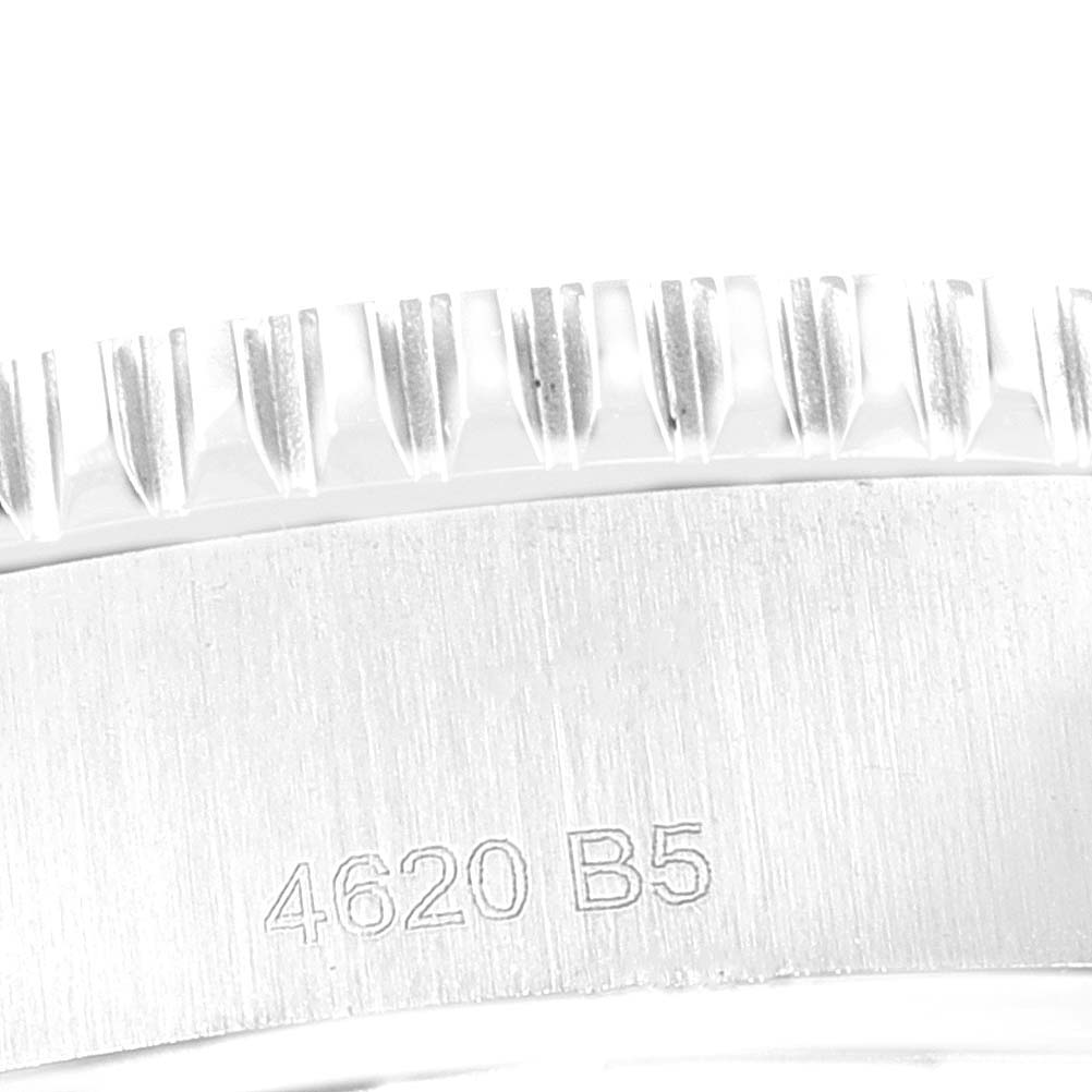 This close-up image shows the bezel and part of the case back of the Breitling Superocean A17366 Men
s Stainless Steel White Dial A17366 Men
s Stainless Steel White Dial watch.