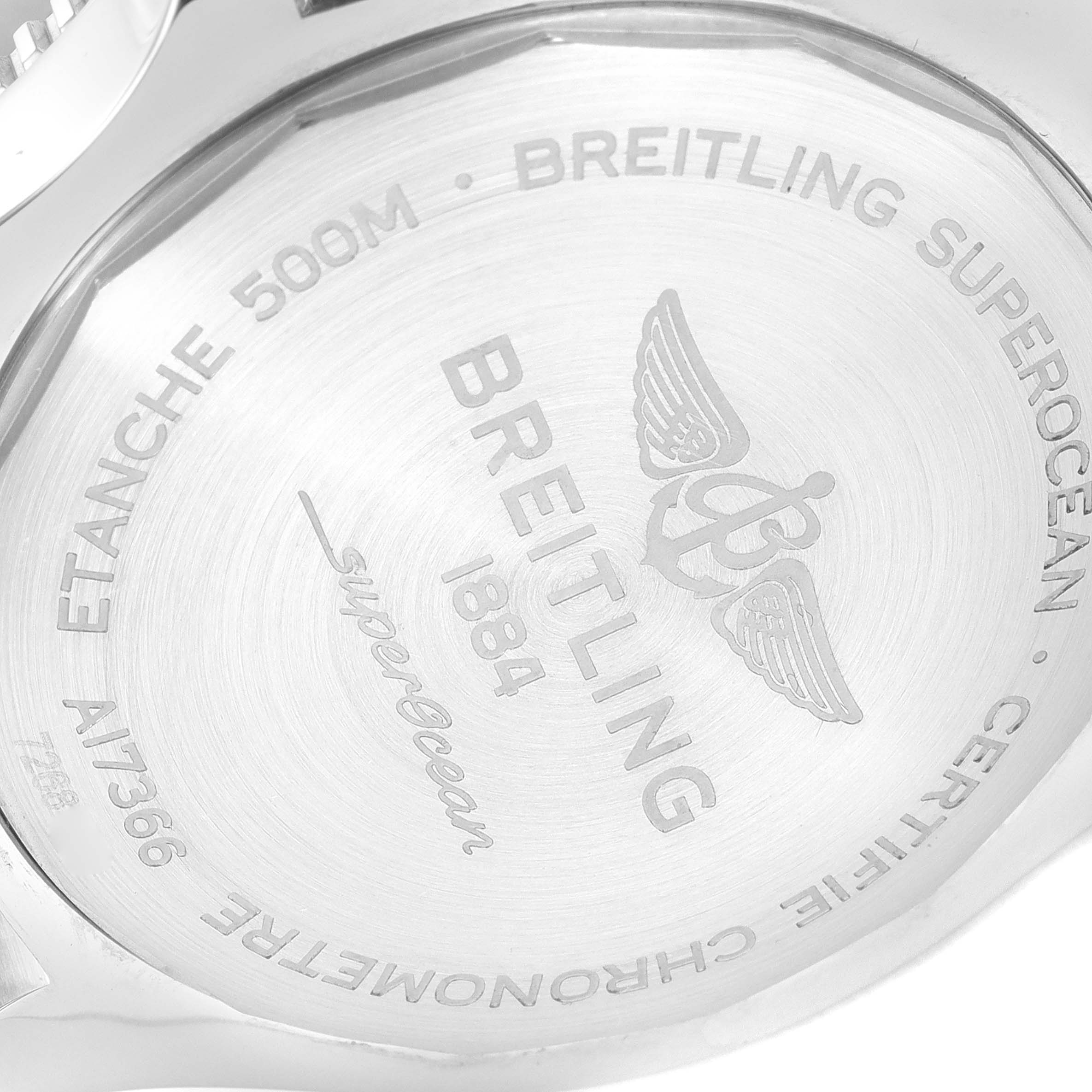 The image shows the back case of a Breitling Superocean A17366 Men
s Stainless Steel White Dial A17366 Men
s Stainless Steel White Dial watch, featuring engraved brand details and water resistance information.