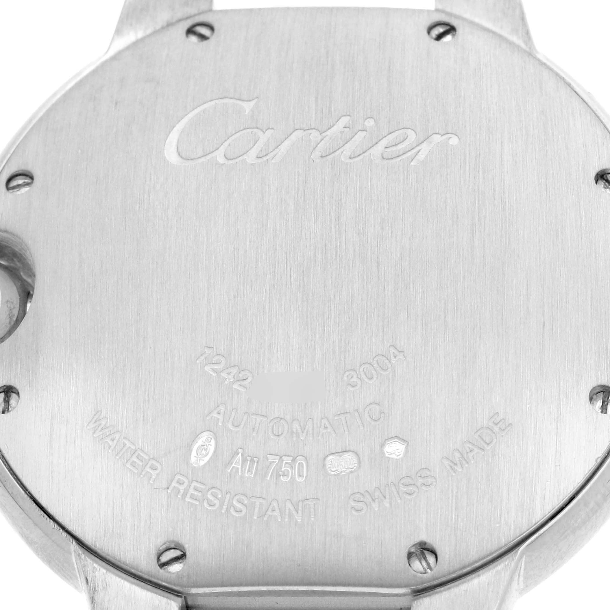 The image shows the back case of a Cartier Ballon Bleu WE900651 Women's White Gold Silver Dial watch with engraved details and markings.