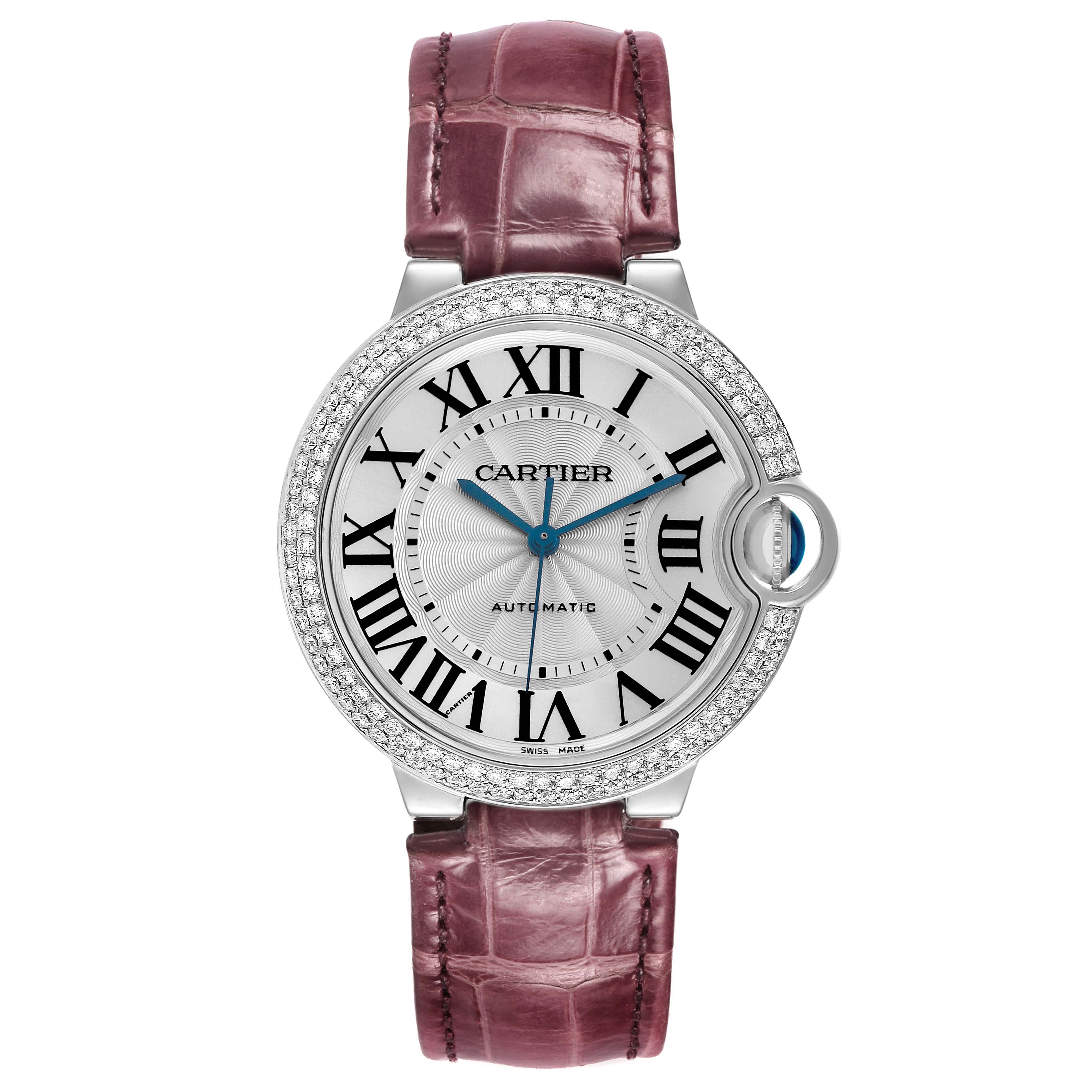 The Cartier Ballon Bleu WE900651 Women's White Gold Silver Dial watch is shown from the front, featuring its round face, Roman numerals, and a leather strap.