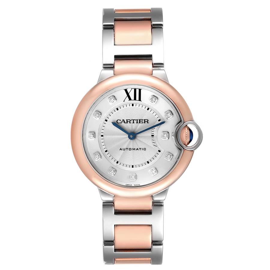 The Cartier Ballon Bleu watch is shown from a top-down angle, displaying the face and bracelet.