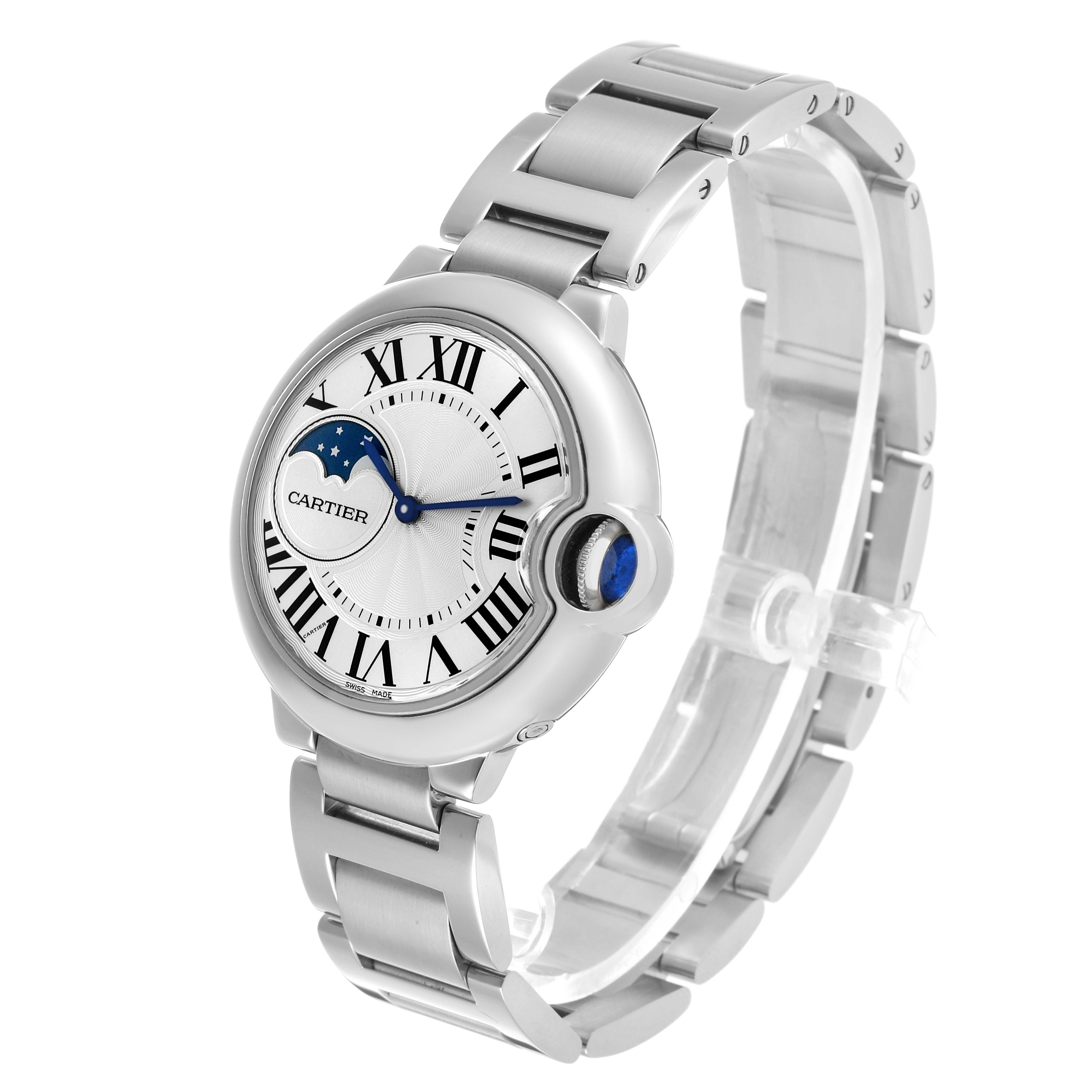 The Cartier Ballon Bleu WSBB0021 Men's Stainless Steel Silver Dial watch is shown at a three-quarter angle, highlighting its face, bracelet, and crown.