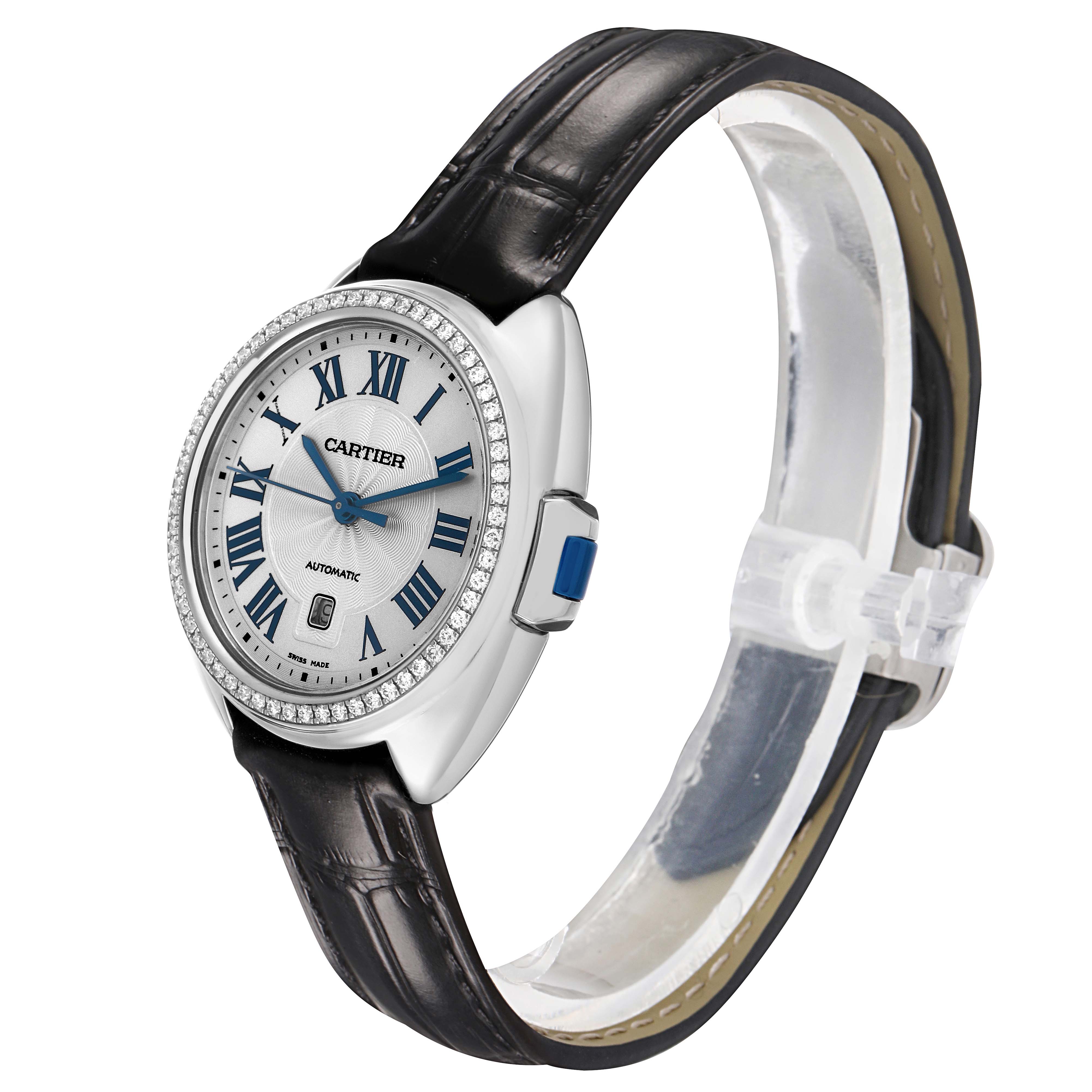 The Cartier Cle W4CL0005 Men's Stainless Steel Silver Dial watch is shown at a slight angle, highlighting its face, bezel, crown, and black leather strap.