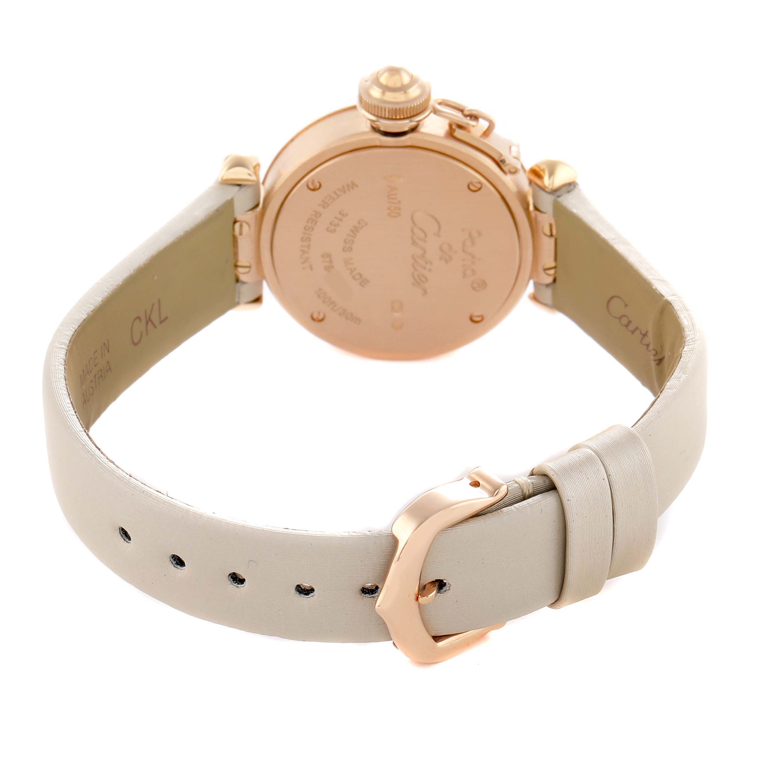 The Cartier Pasha WJ124028 Women's Rose Gold Silver Dial watch is shown from the back, highlighting the case back, crown, and leather strap with buckle.