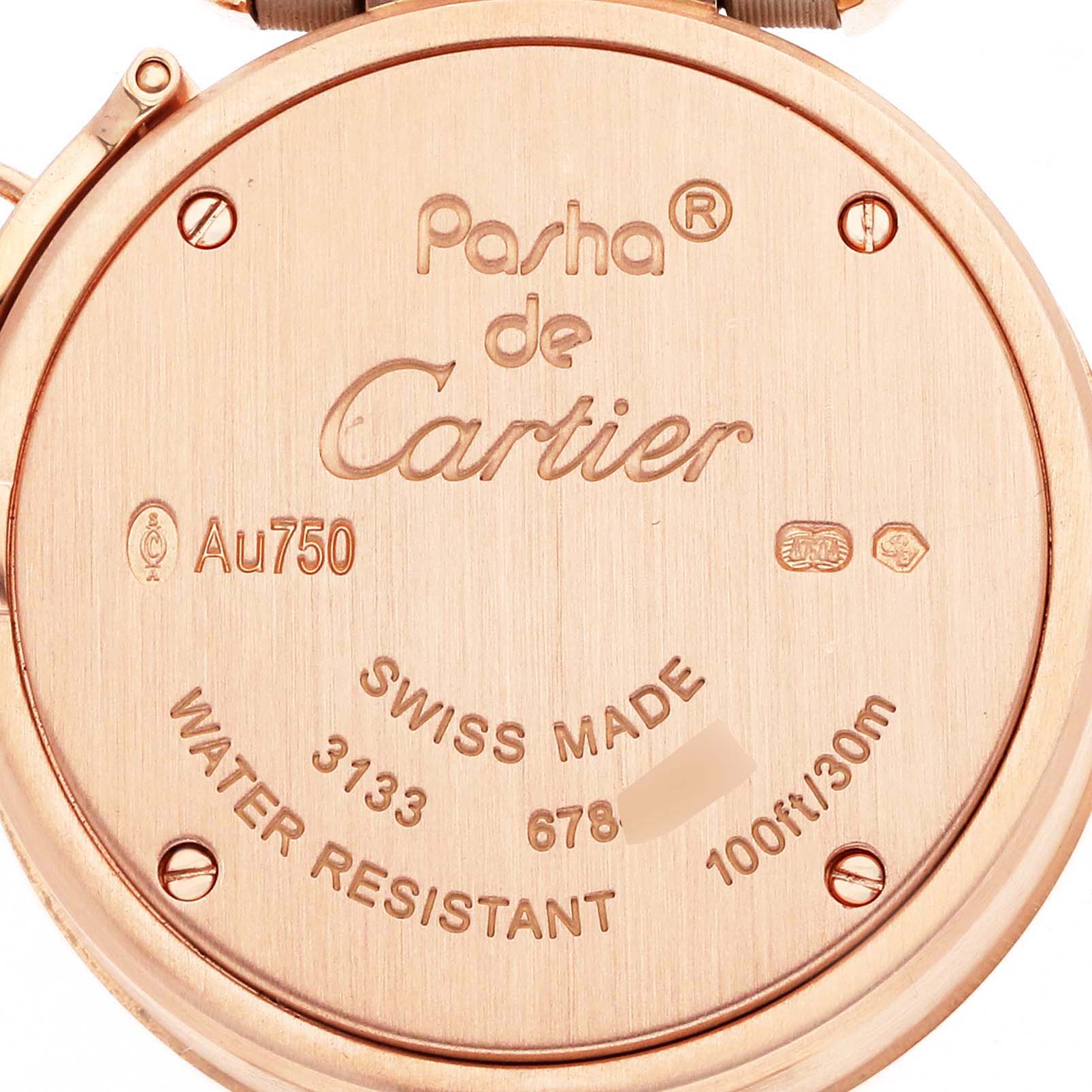 The image shows the back case of a Cartier Pasha WJ124028 Women's Rose Gold Silver Dial watch, displaying brand markings and specifications.