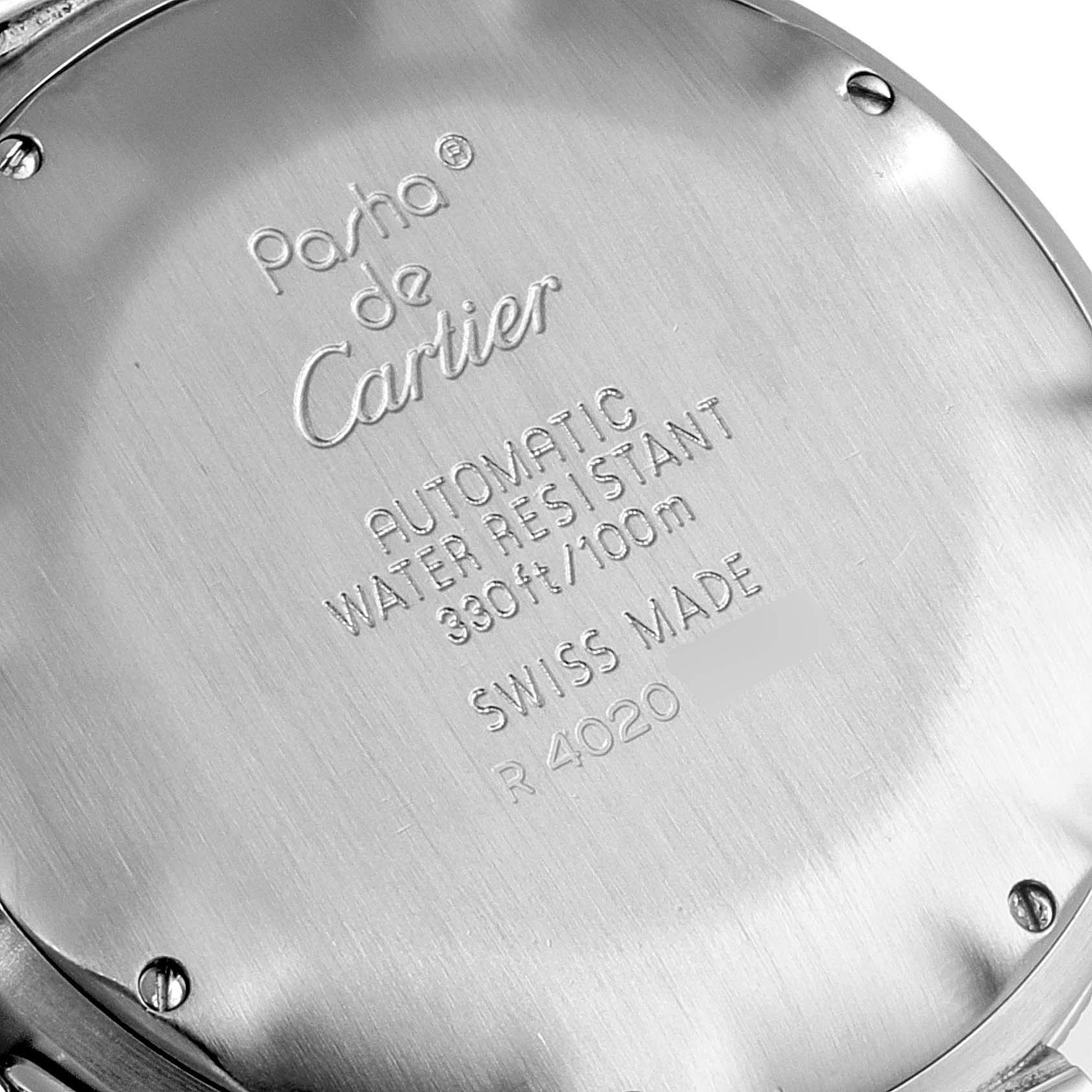 This image shows the back casing of a Pasha de Cartier watch, highlighting its engraved details.