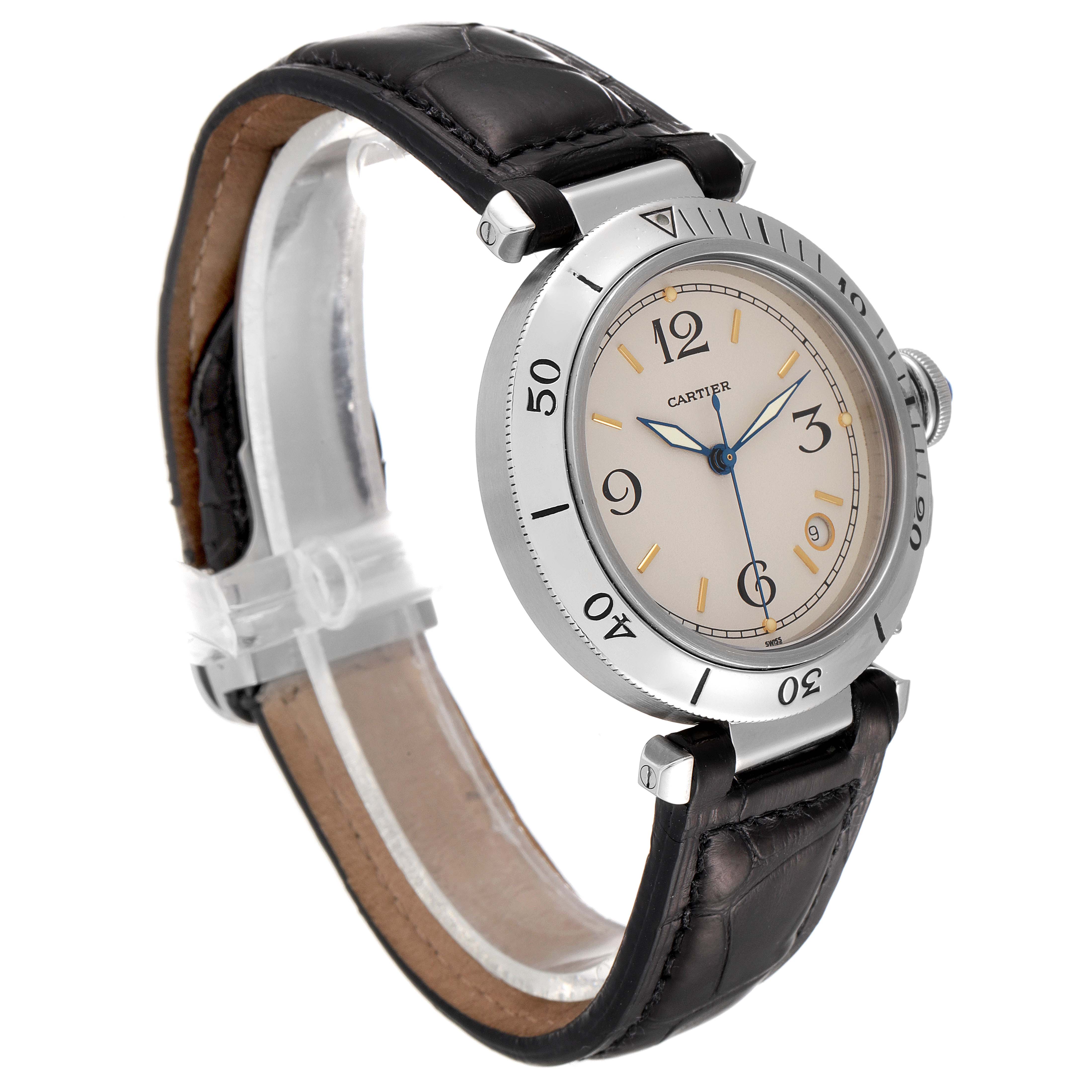 The Cartier Pasha Men's Stainless Steel Beige Dial Men's Stainless Steel Beige Dial watch is shown at an angled view, highlighting its face, bezel, and leather strap.