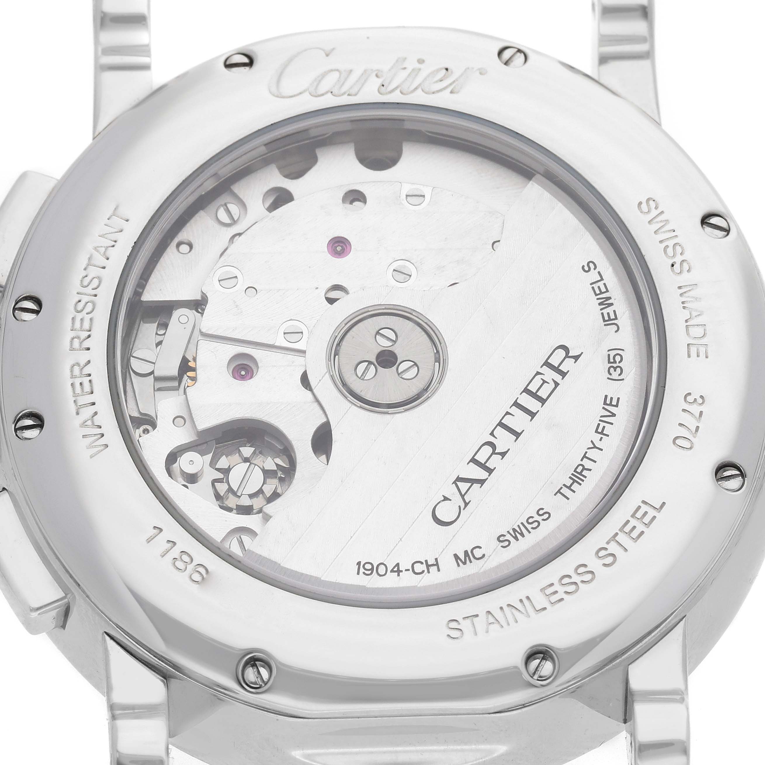 The image shows the back of a Cartier Rotonde WSRO0002 Men's Stainless Steel Silver Dial watch, highlighting its movement and engravings.