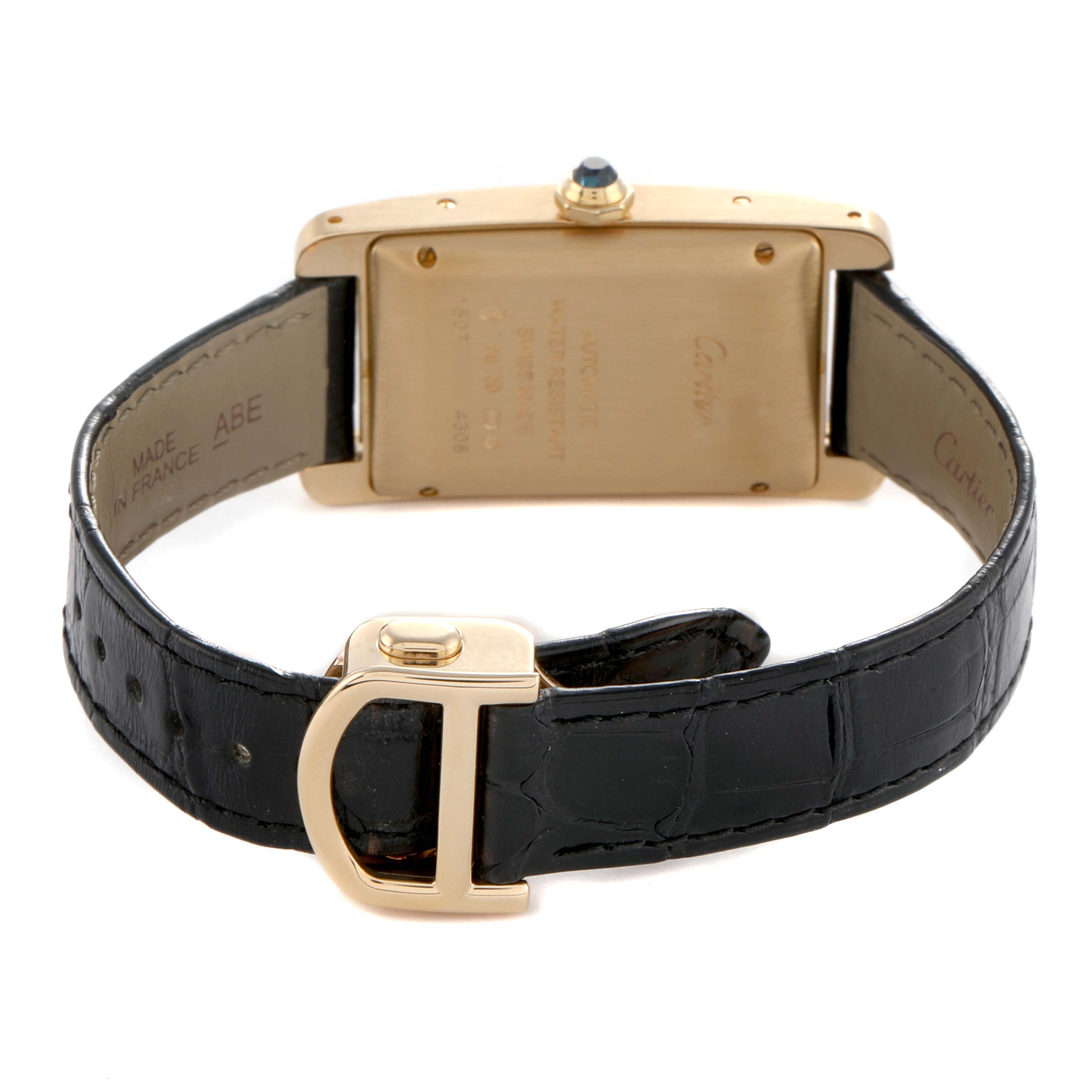 The image shows the back of a Cartier Tank Americaine WGTA0040 Women's Rose Gold Silver Dial watch, featuring the case back, deployment clasp, and leather strap.