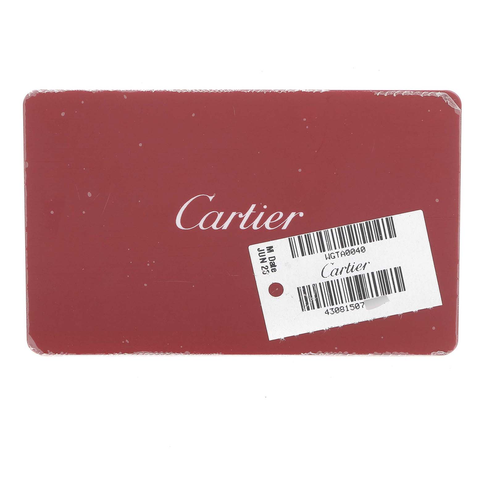 The image shows a Cartier warranty card for the Tank Americaine model, featuring the brand name prominently.