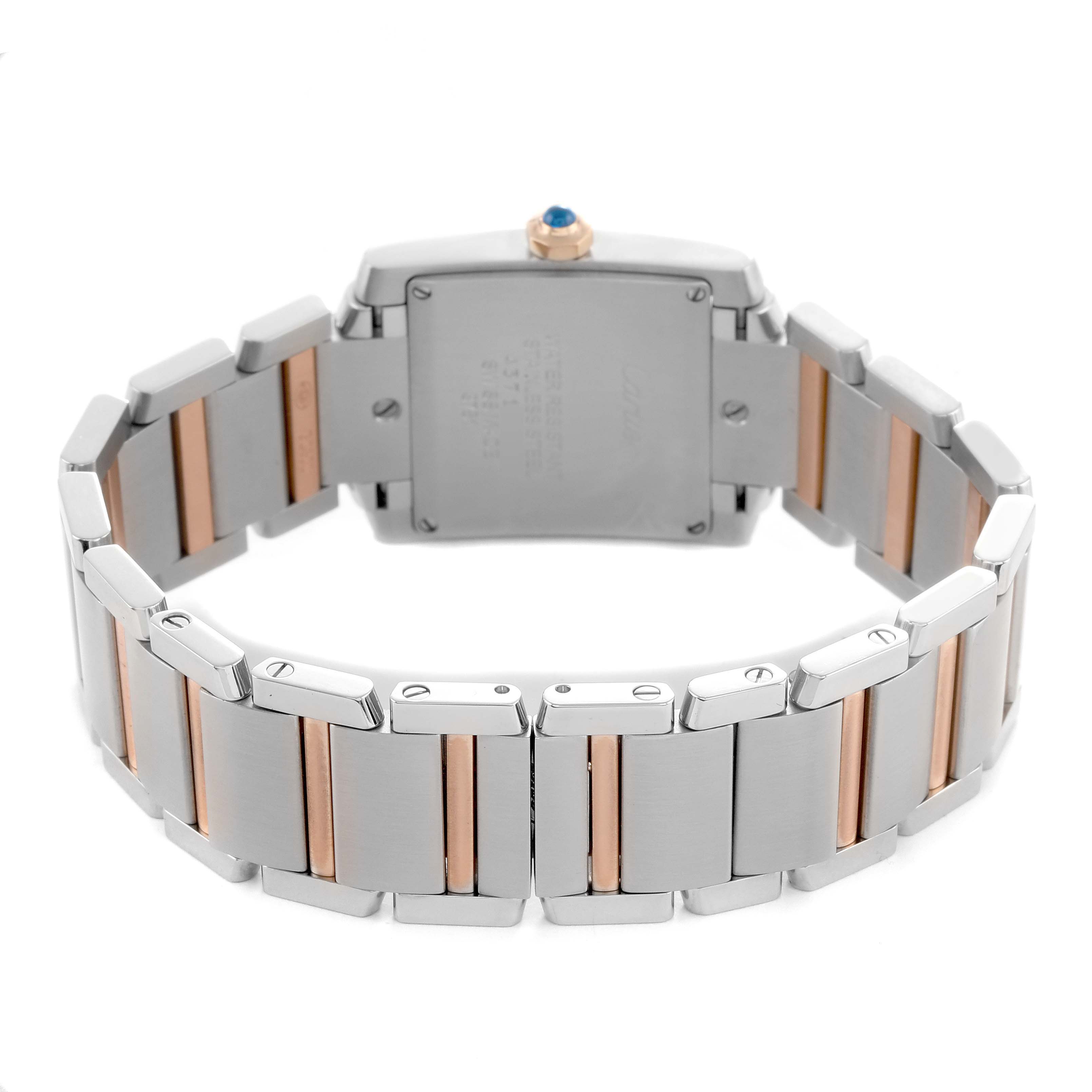 The image shows the back of a Cartier Tank Française watch, highlighting its bracelet and clasp with a partial view of the case back.