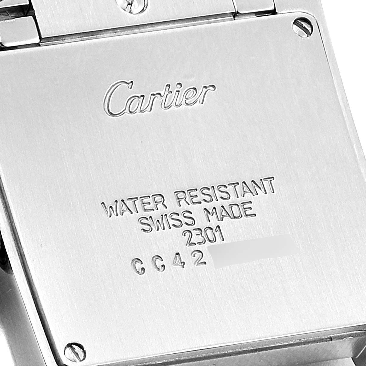 This is a close-up image of the back case of a Cartier Tank Francaise W51012Q4 Women's Steel and Gold (two tone) Silver Dial W51012Q4 Women's Steel and Gold (two tone) Silver Dial watch.