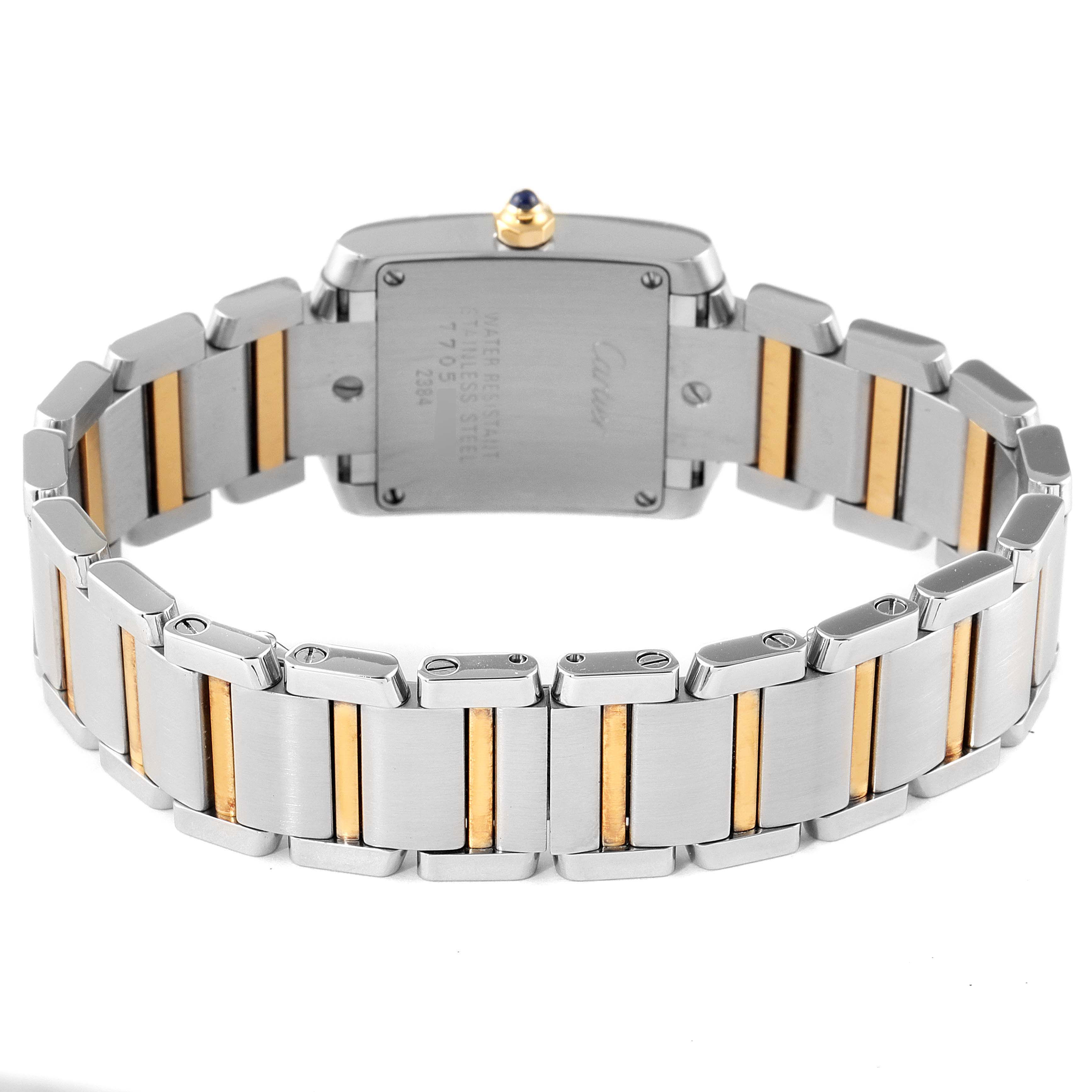 The image shows the back case and bracelet of the Cartier Tank Francaise W51007Q4 Women
s Steel and Gold (two tone) Silver Dial W51007Q4 Women
s Steel and Gold (two tone) Silver Dial watch at a rear angle.