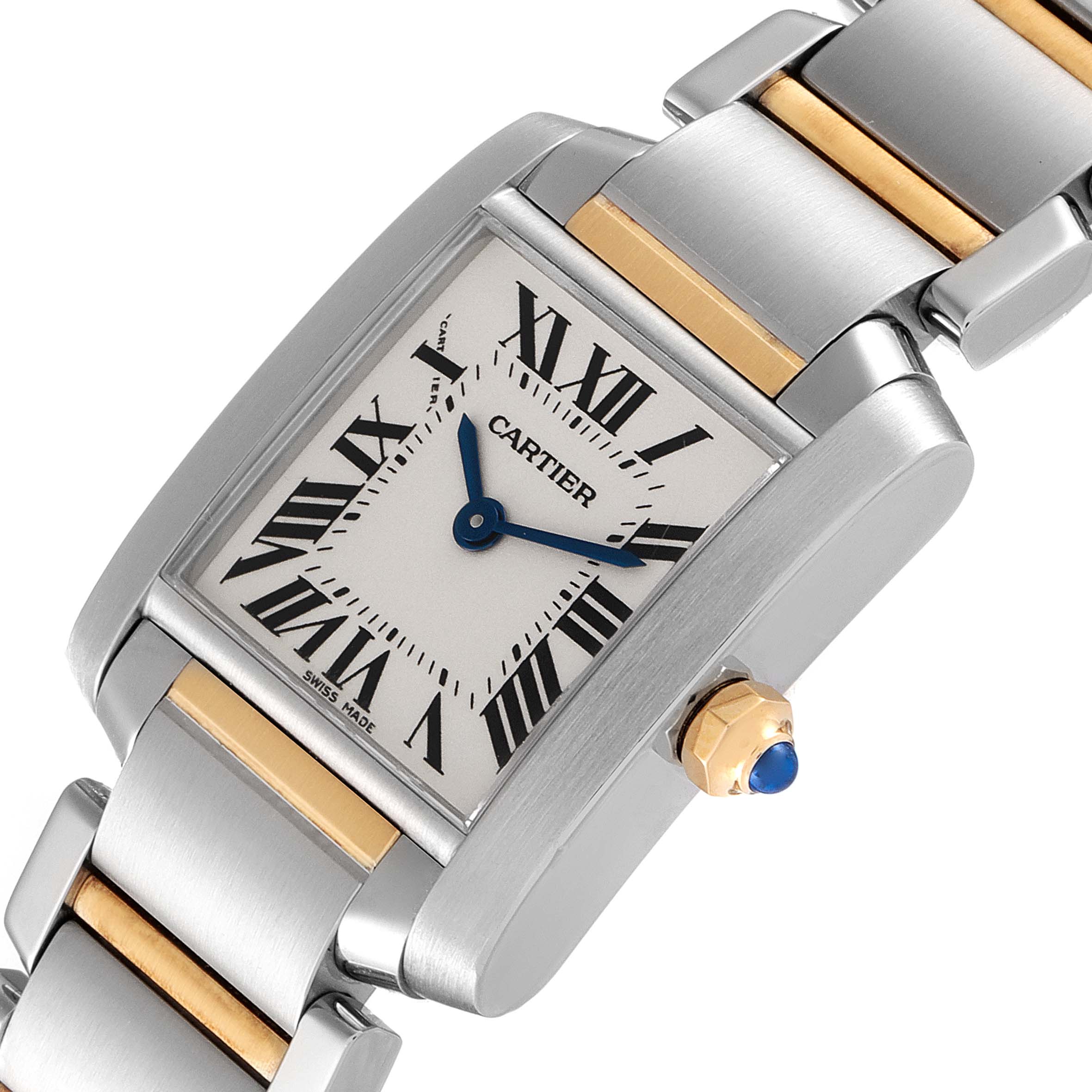 The Tank Francaise watch by Cartier is shown at an angled close-up, highlighting the face, crown, and part of the bracelet.