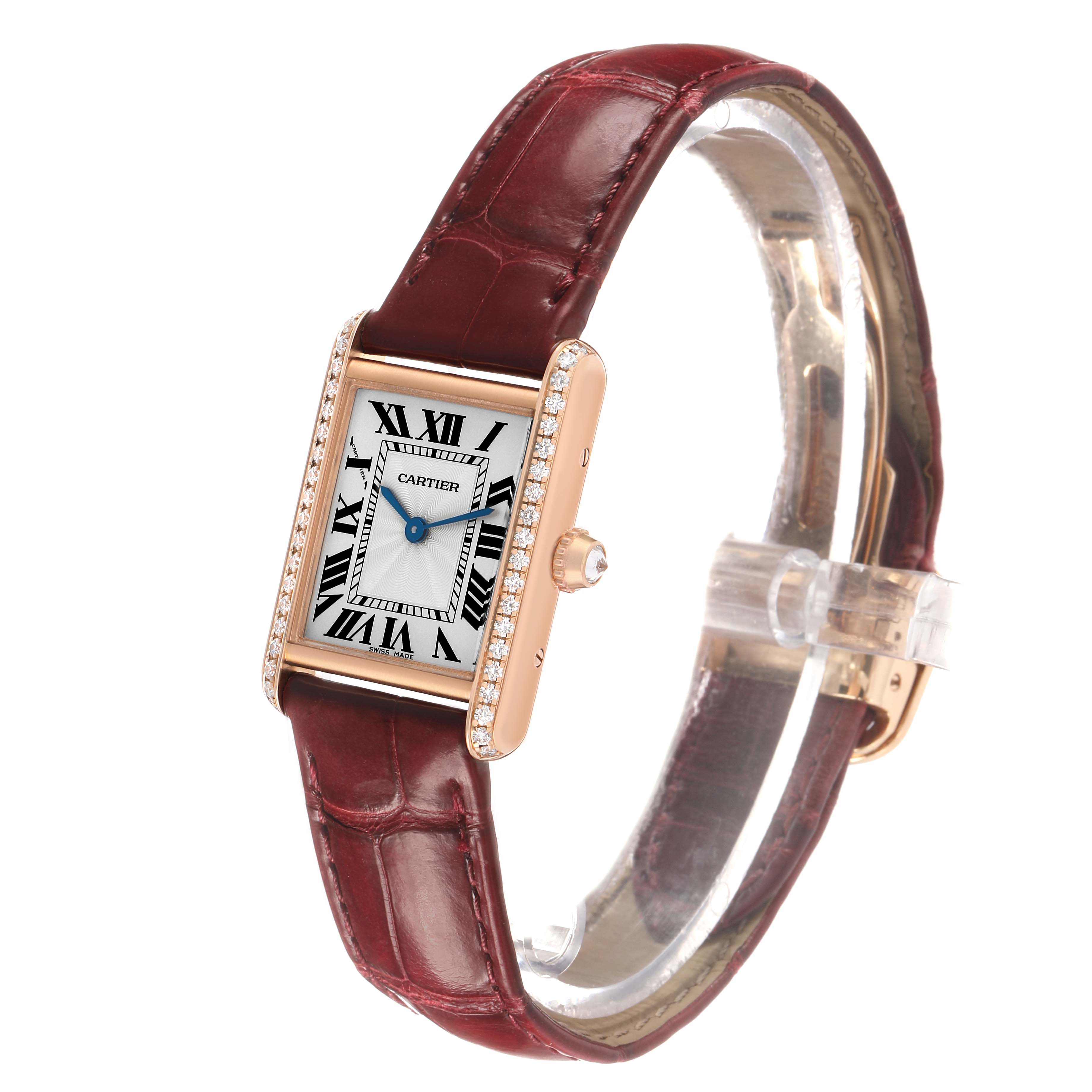 The Cartier Tank Louis WJTA0010 Women's Rose Gold Silver Dial watch is shown at an oblique angle, displaying its face, strap, and side view with a visible crown.