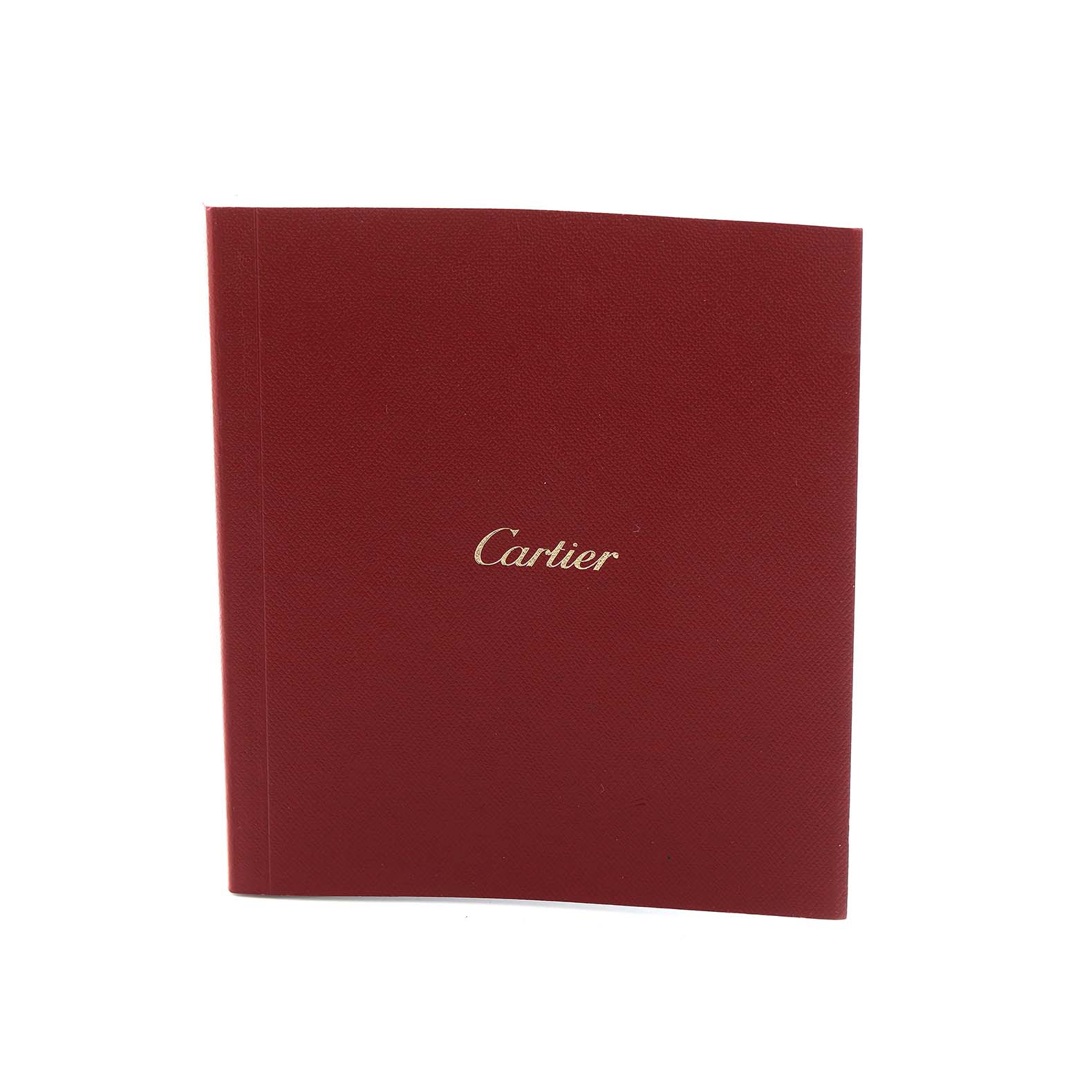 The image shows the Cartier Tank Solo W5200024 Women's Rose Gold Silver Dial's red instruction manual cover with the Cartier logo.