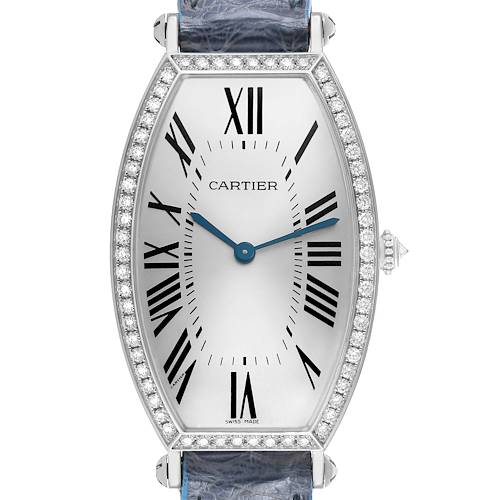 The Cartier Tonneau WE400251 Women's White Gold Silver Dial watch is shown from the front, highlighting the dial, Roman numerals, and diamond bezel.