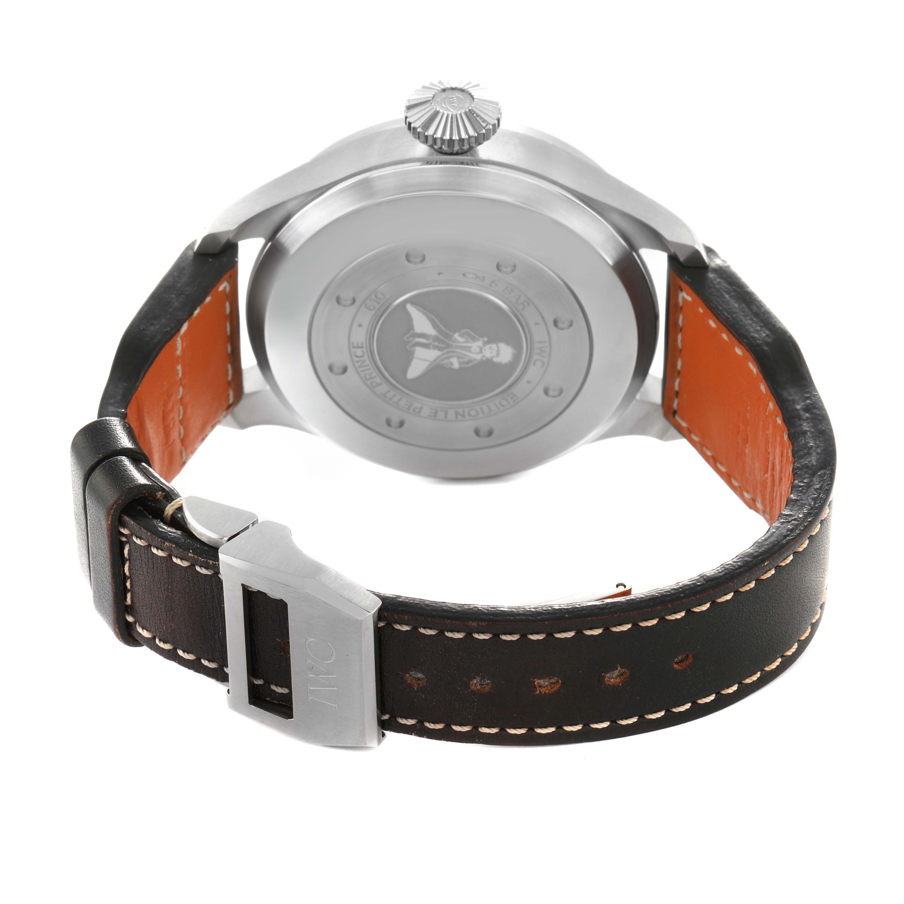 The image shows the back of the IWC Pilot IW501002 Men's Stainless Steel Blue Dial model watch, featuring its case back, crown, and leather strap with a clasp.