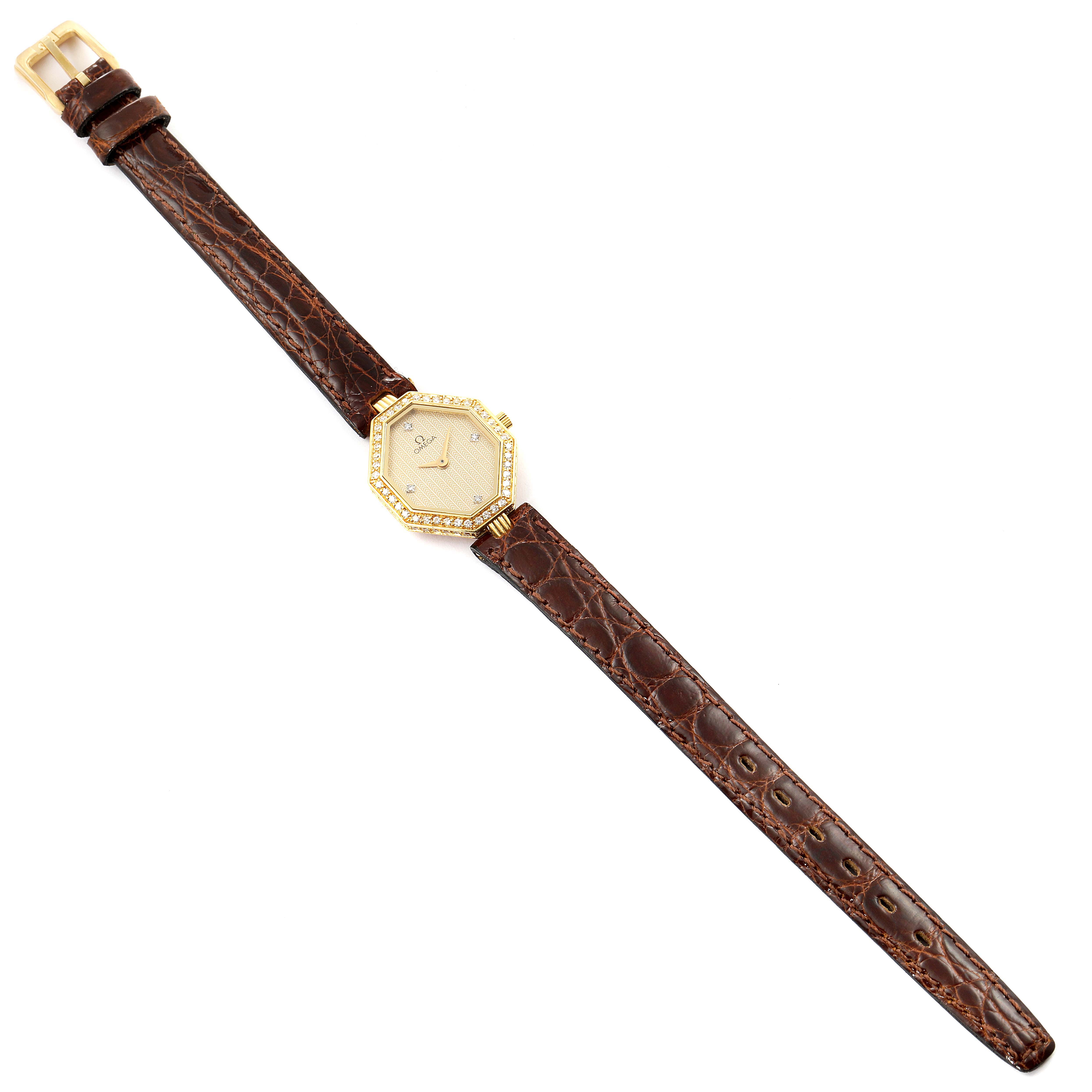 The image shows the front view of an Omega 1450 Women's Yellow Gold Champagne Dial 1450 Women's Yellow Gold Champagne Dial DeVille Mini Yellow Gold Diamond Cocktail Ladies Watch 1450 Unworn model.