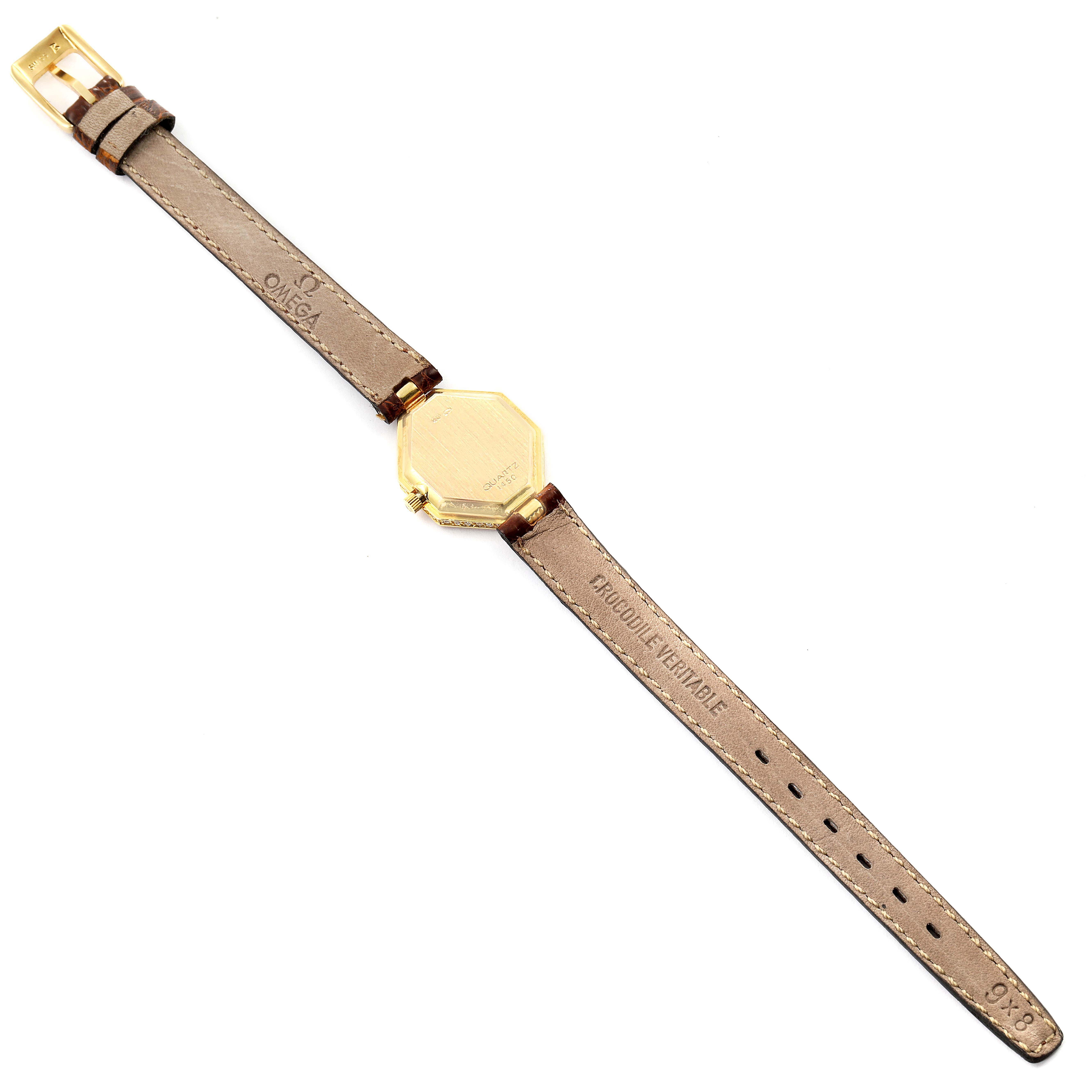The image shows the back angle of the Omega 1450 Women's Yellow Gold Champagne Dial 1450 Women's Yellow Gold Champagne Dial DeVille Mini Yellow Gold Diamond Cocktail Ladies Watch 1450, displaying the leather strap and case back.
