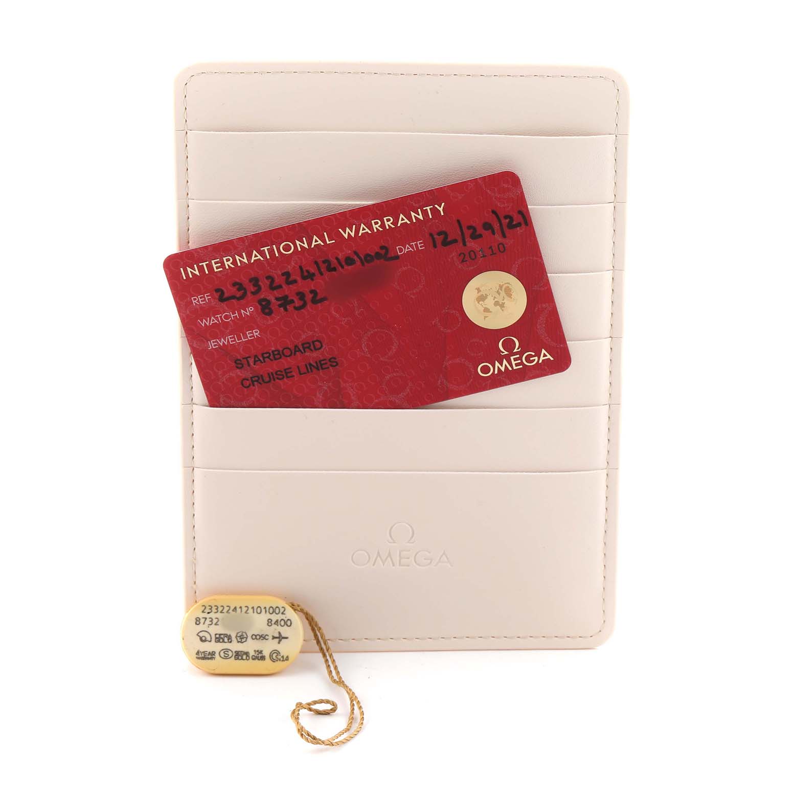 The image shows an Omega Seamaster 233.22.41.21.01.002 Men's Stainless Steel Black Dial warranty card and a tag displayed on a white Omega cardholder.