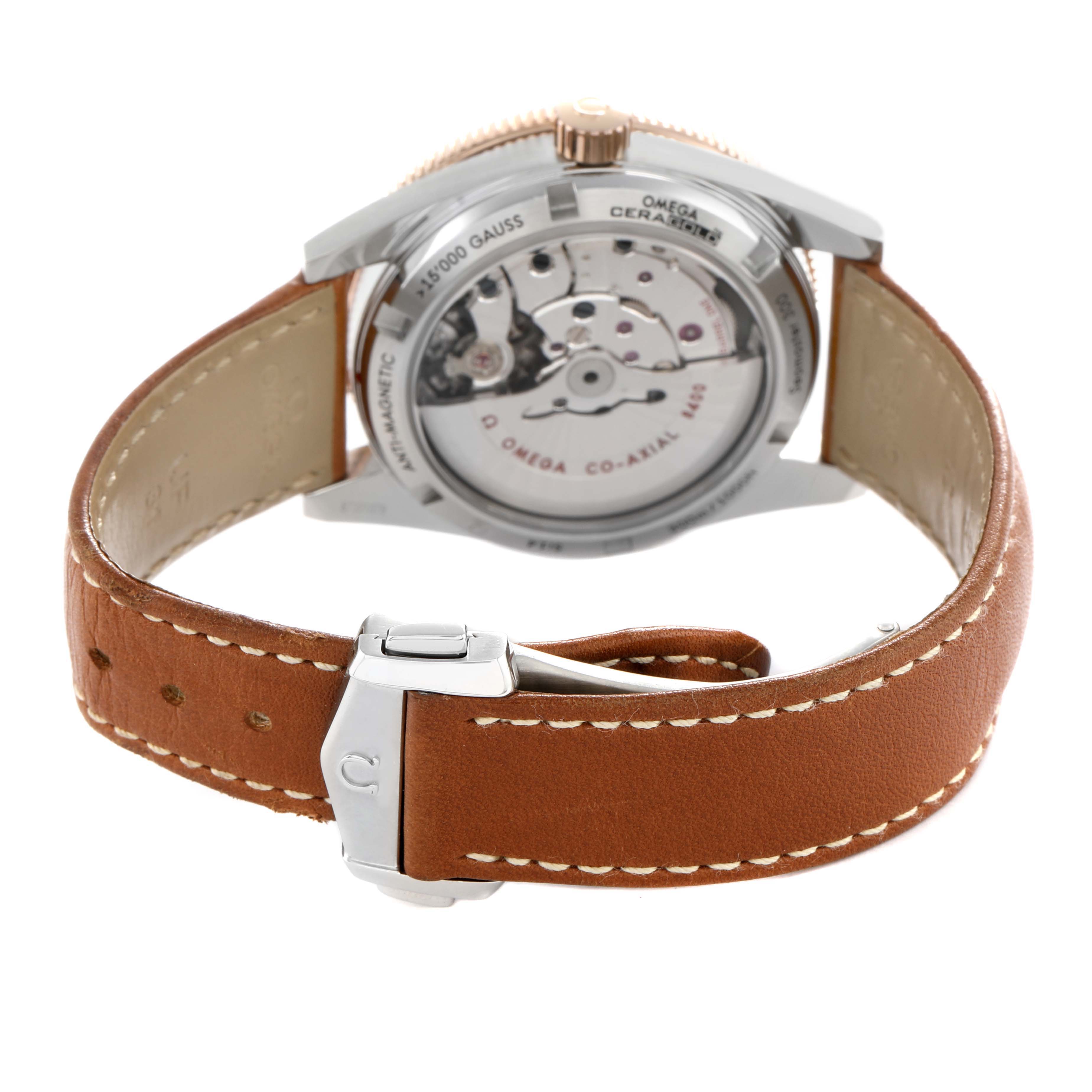 The image shows the back case and strap of an Omega Seamaster 233.22.41.21.01.002 Men's Stainless Steel Black Dial model, highlighting the movement and clasp.