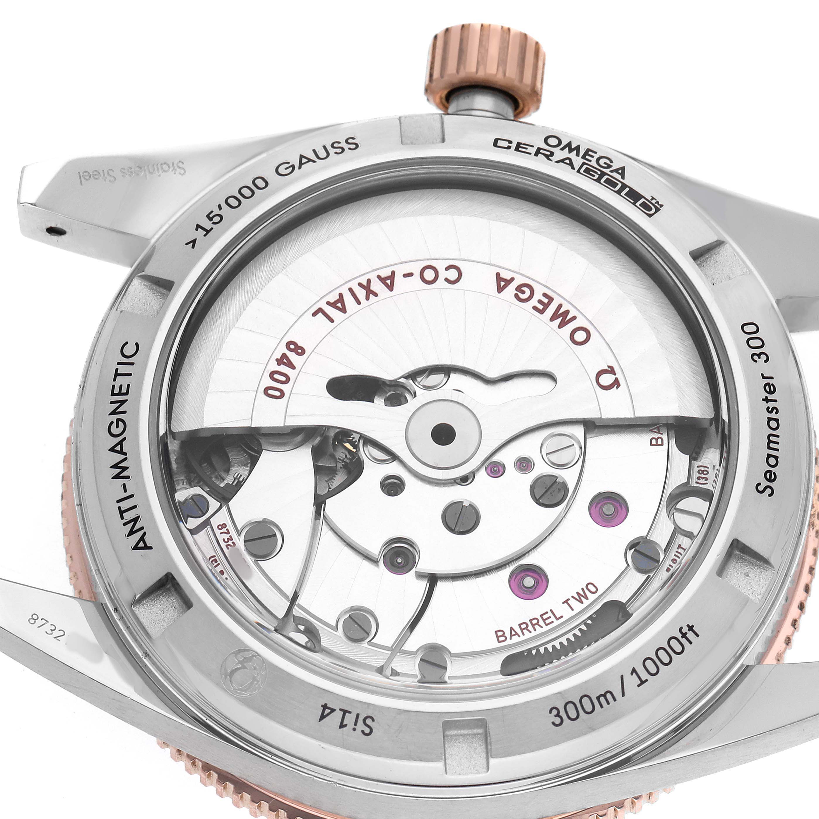 The image shows a close-up of the Omega Seamaster 233.22.41.21.01.002 Men's Stainless Steel Black Dial's transparent case back, revealing its movement and engravings.