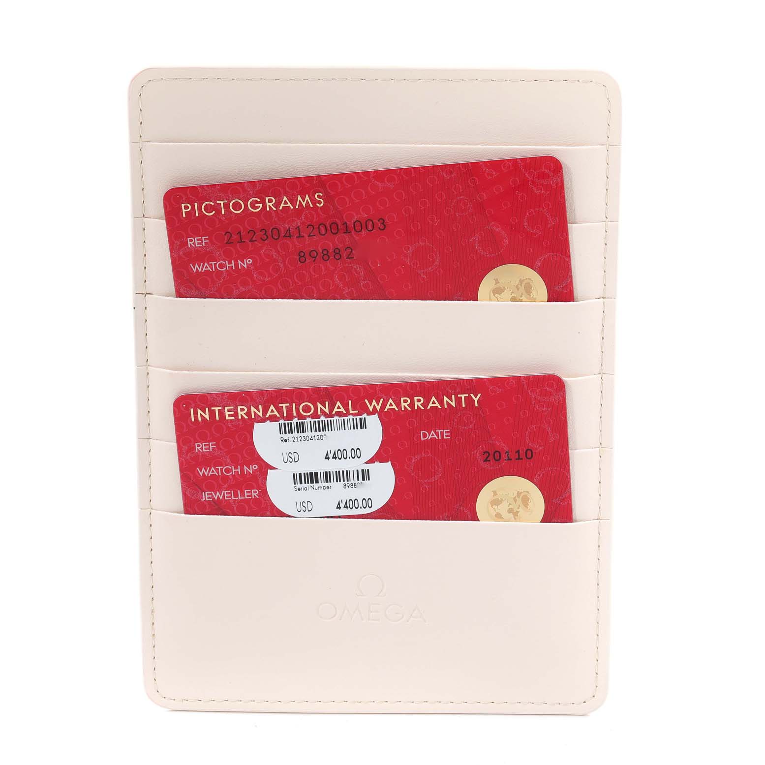 The image shows the warranty cards for an Omega Seamaster 212.30.41.20.01.003 Men's Stainless Steel Black Dial 212.30.41.20.01.003 Men's Stainless Steel Black Dial watch in a cream cardholder.