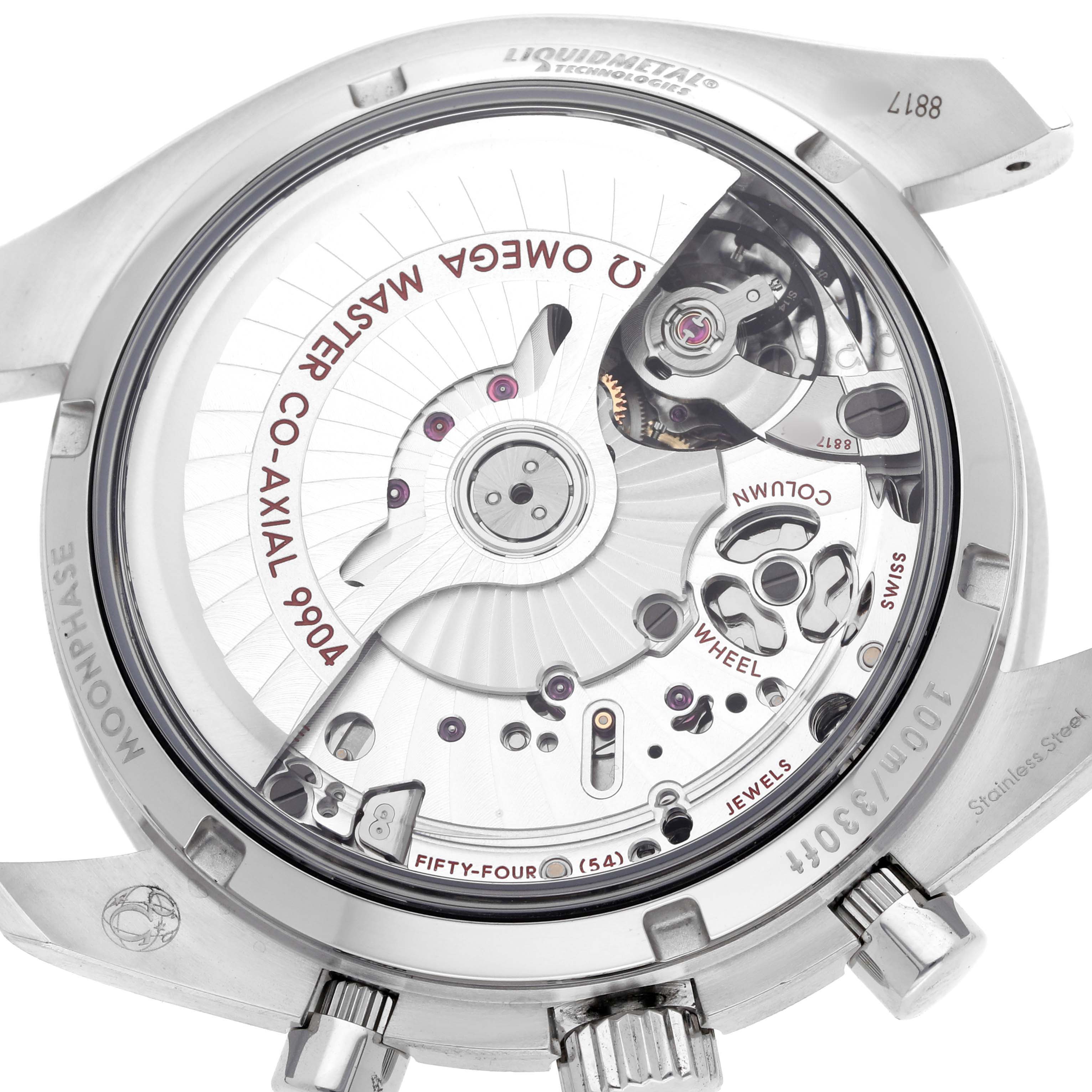 The image shows the back view of an Omega Speedmaster 304.33.44.52.03.001 Men's Stainless Steel Blue Dial, highlighting its Co-Axial 9904 movement and inner workings.