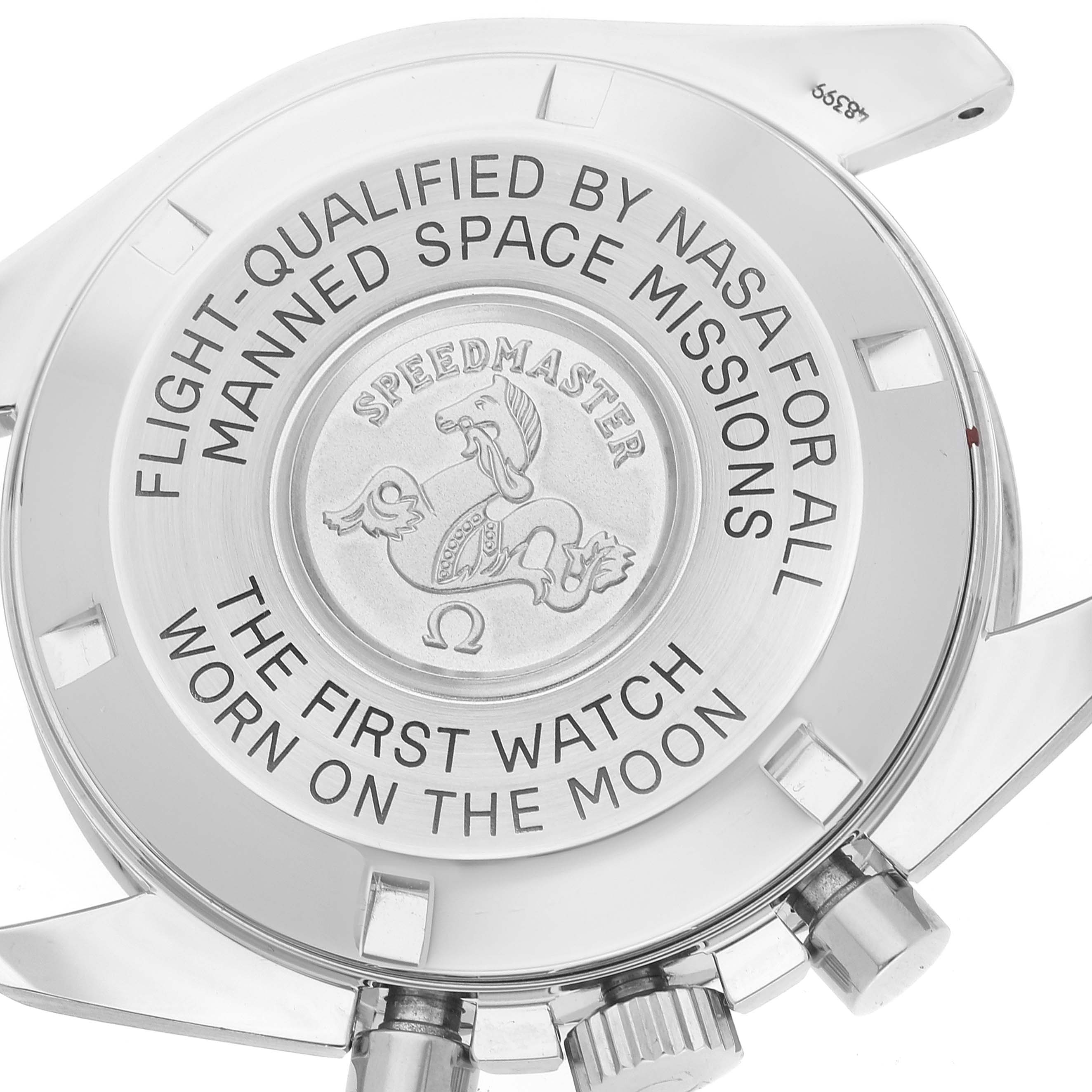 The image shows the back case of the Omega Speedmaster 3570.50.00 Men
s Stainless Steel Black Dial 3570.50.00 Men
s Stainless Steel Black Dial watch, highlighting engravings and part of the watch
s crown and pushers.