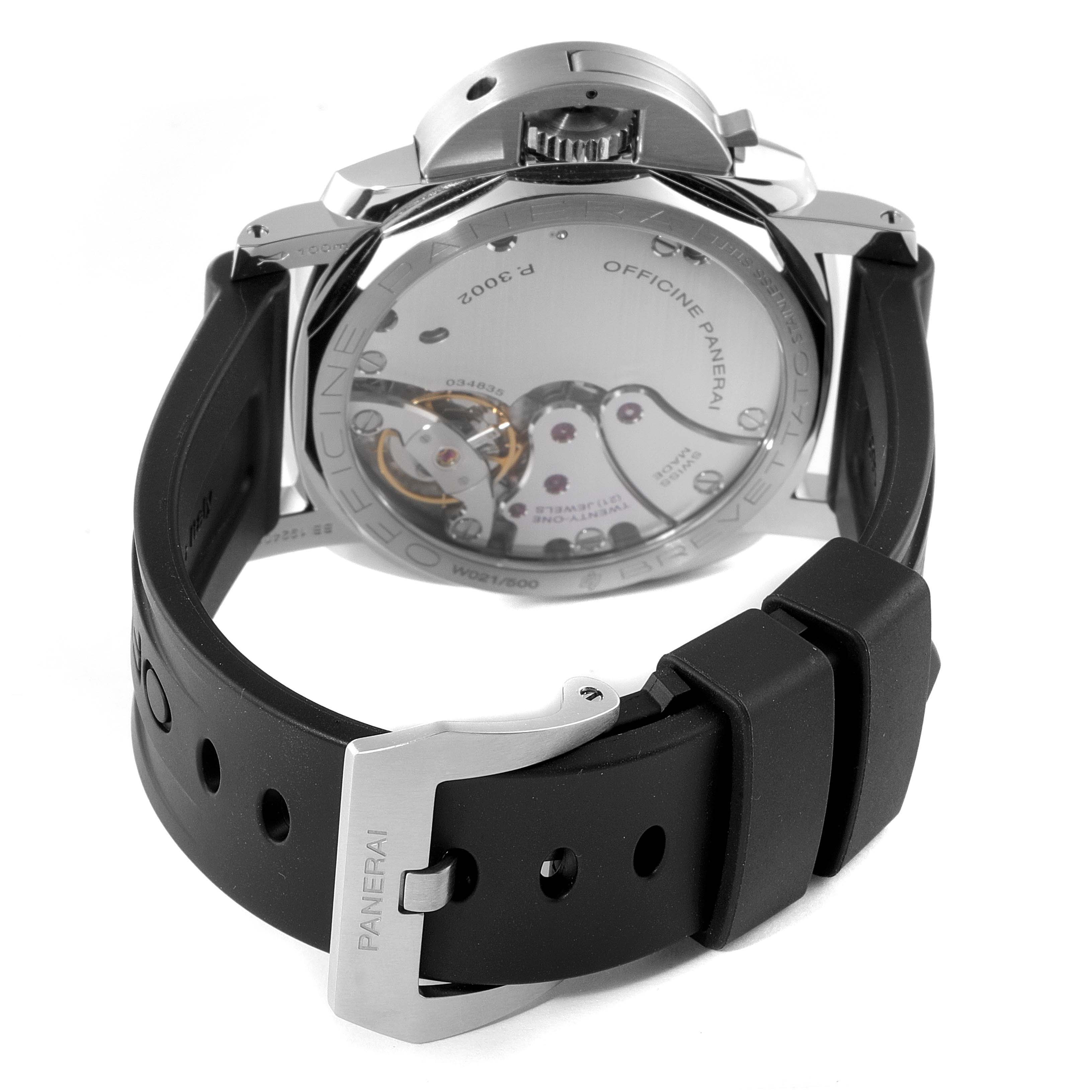 The image shows the back view of a Panerai Luminor PAM00423 Men
s Stainless Steel Black Dial PAM00423 Men
s Stainless Steel Black Dial watch, highlighting its movement and the black rubber strap with the Panerai buckle.