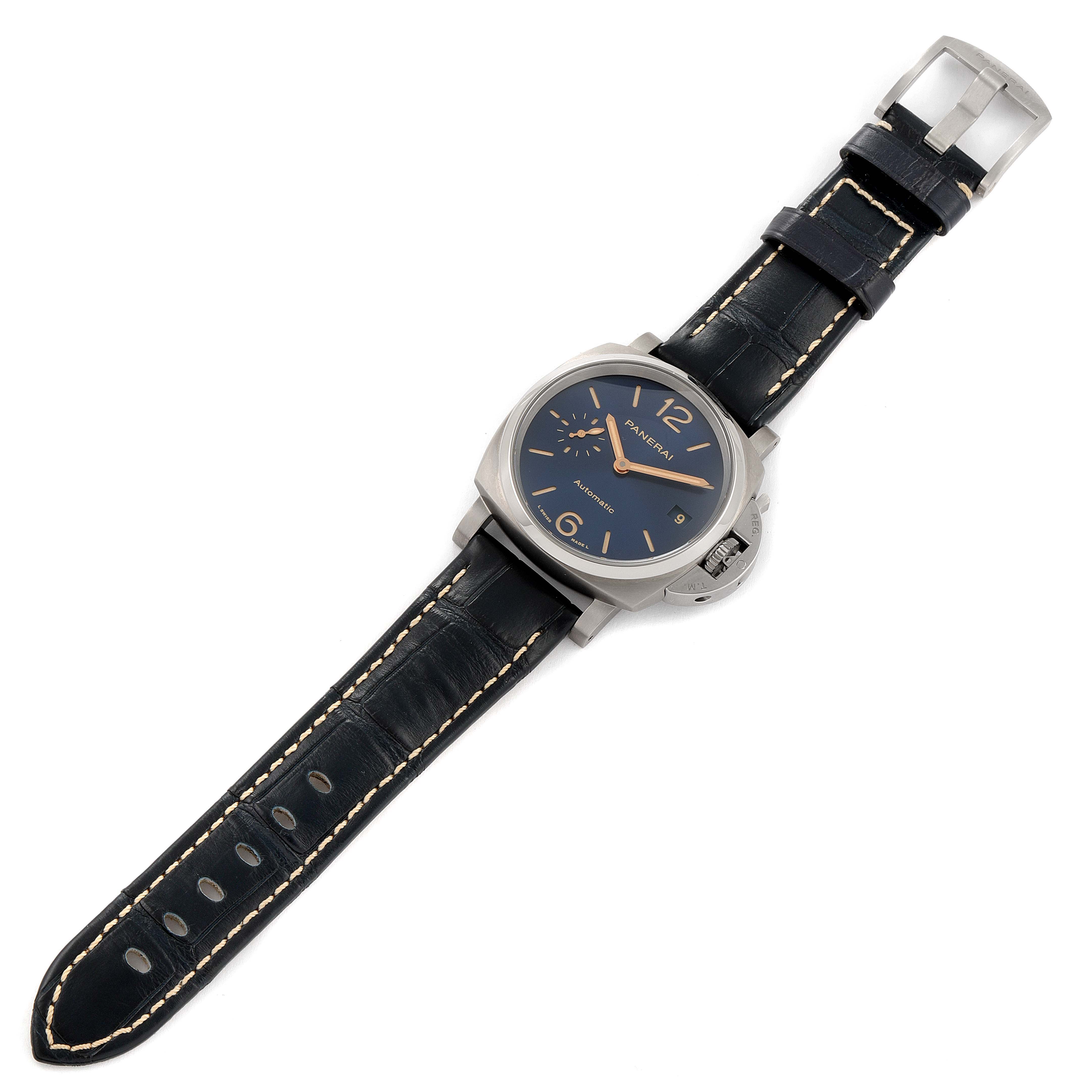 The Panerai Luminor Due PAM00926 Men's Titanium Blue Dial PAM00926 Men's Titanium Blue Dial watch is shown from a top-down angle, featuring its dial, case, crown, and leather strap.