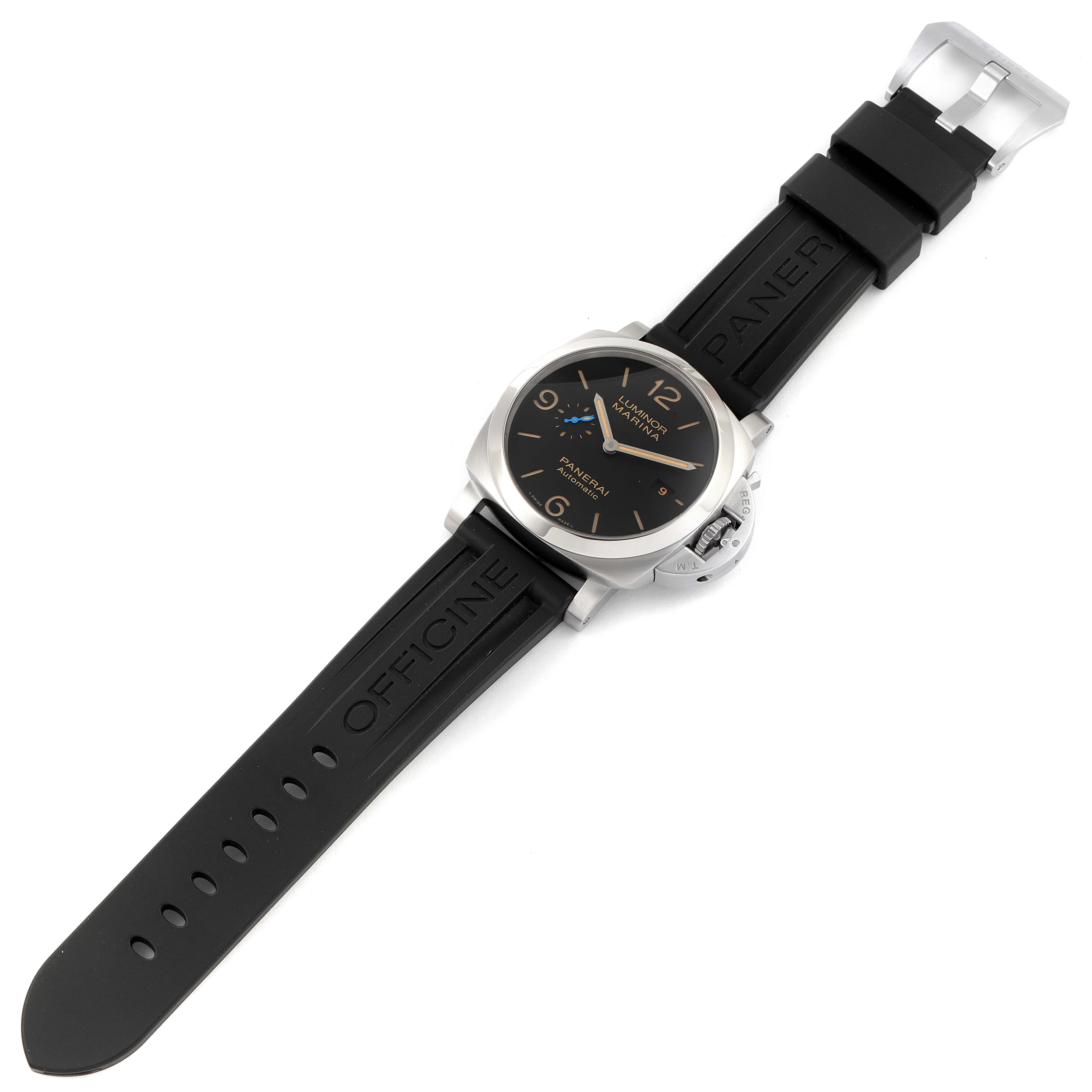 The image shows a Panerai Luminor PAM01392 Men
s Stainless Steel Black Dial PAM01392 Men
s Stainless Steel Black Dial watch from a slightly elevated top view, highlighting its black strap and silver case.