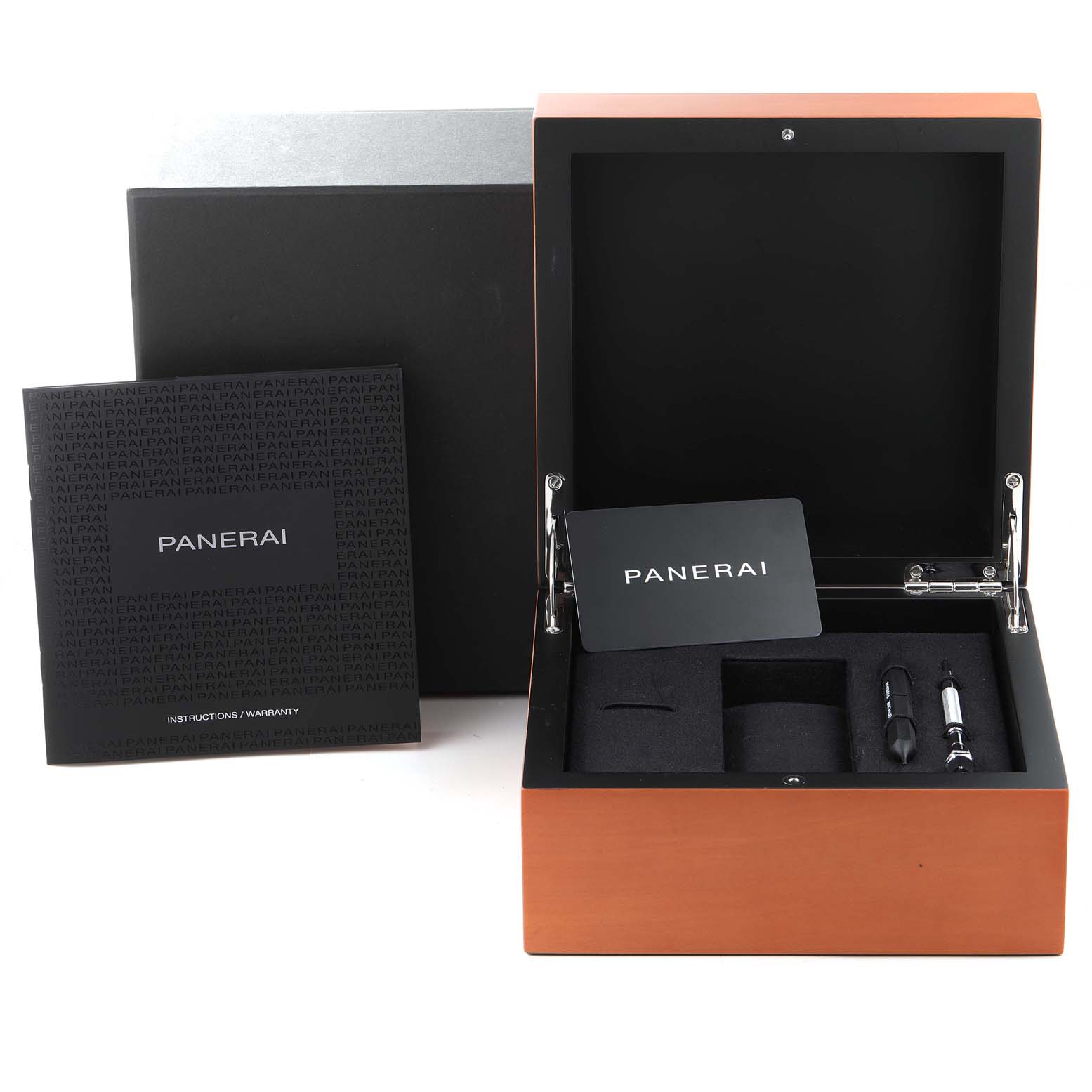 The image shows the packaging and components of a Panerai Luminor PAM01392 Men
s Stainless Steel Black Dial PAM01392 Men
s Stainless Steel Black Dial watch, including the storage box, warranty card, and instruction manual.