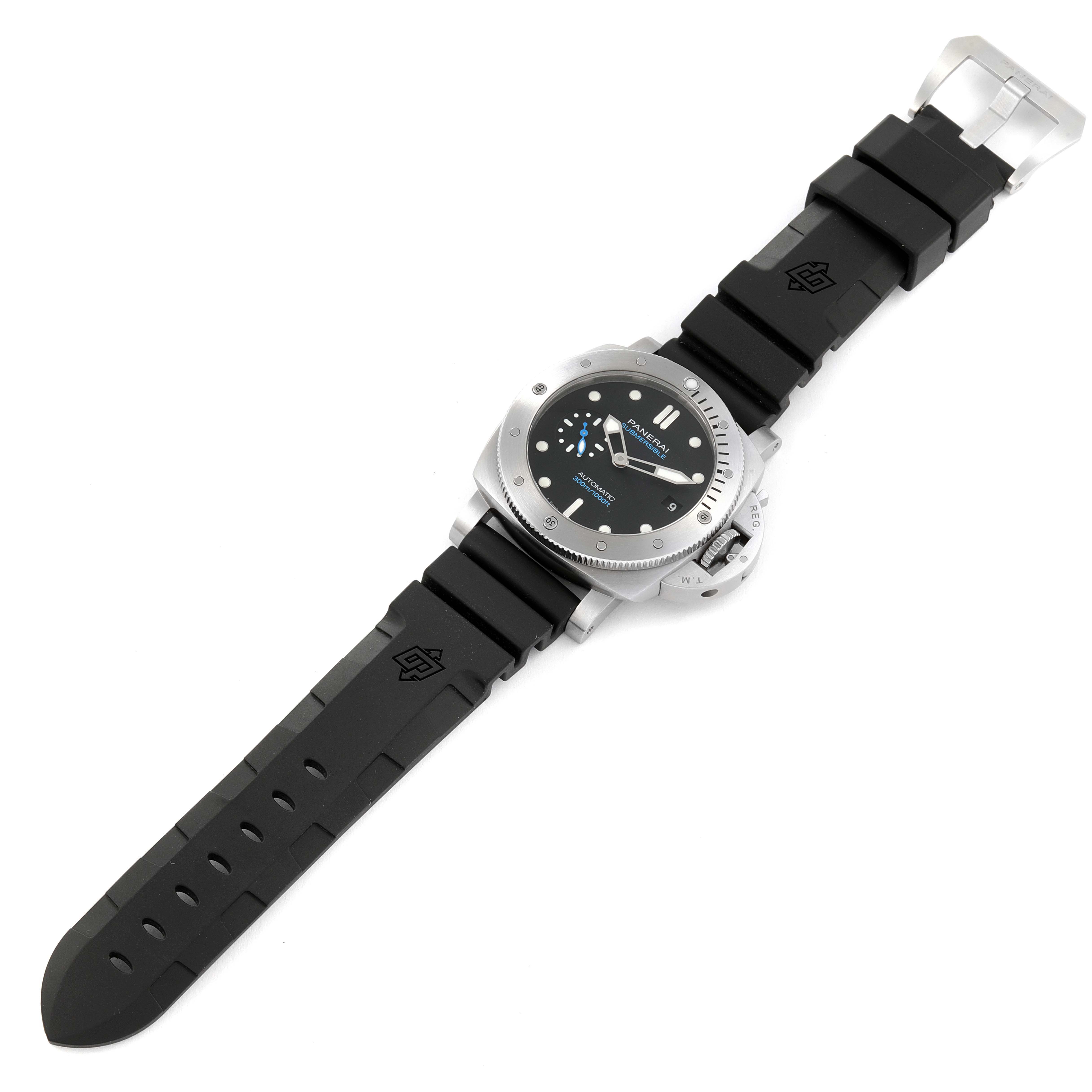 The image shows a Panerai Submersible PAM00973 Men's Stainless Steel Black Dial PAM00973 Men's Stainless Steel Black Dial watch from an angled top view, highlighting its dial, bezel, and black rubber strap.